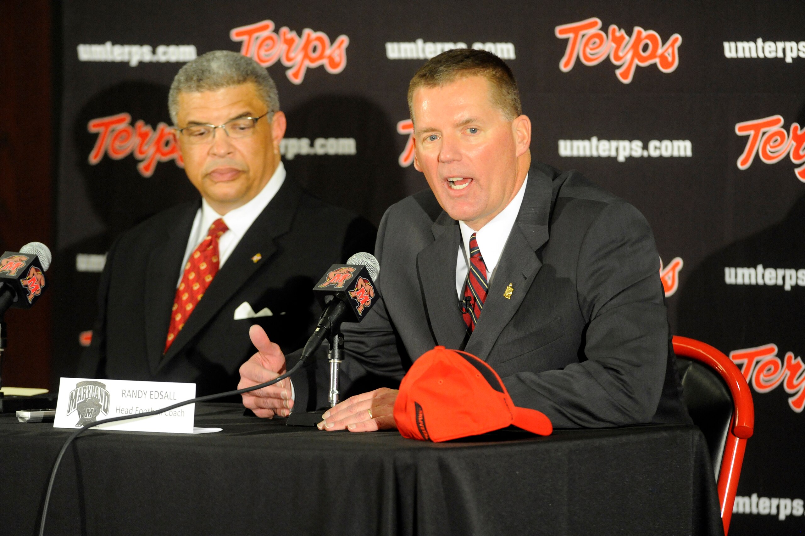 COLLEGE PARK, MD - JANUARY 3:  Randy Edsall speaks as he is introduced as the University of Maryland Terps new head football coach as Athletic Director Kevin Anderson (L) of the University of Maryland looks on during a press conference on January 3, 2011