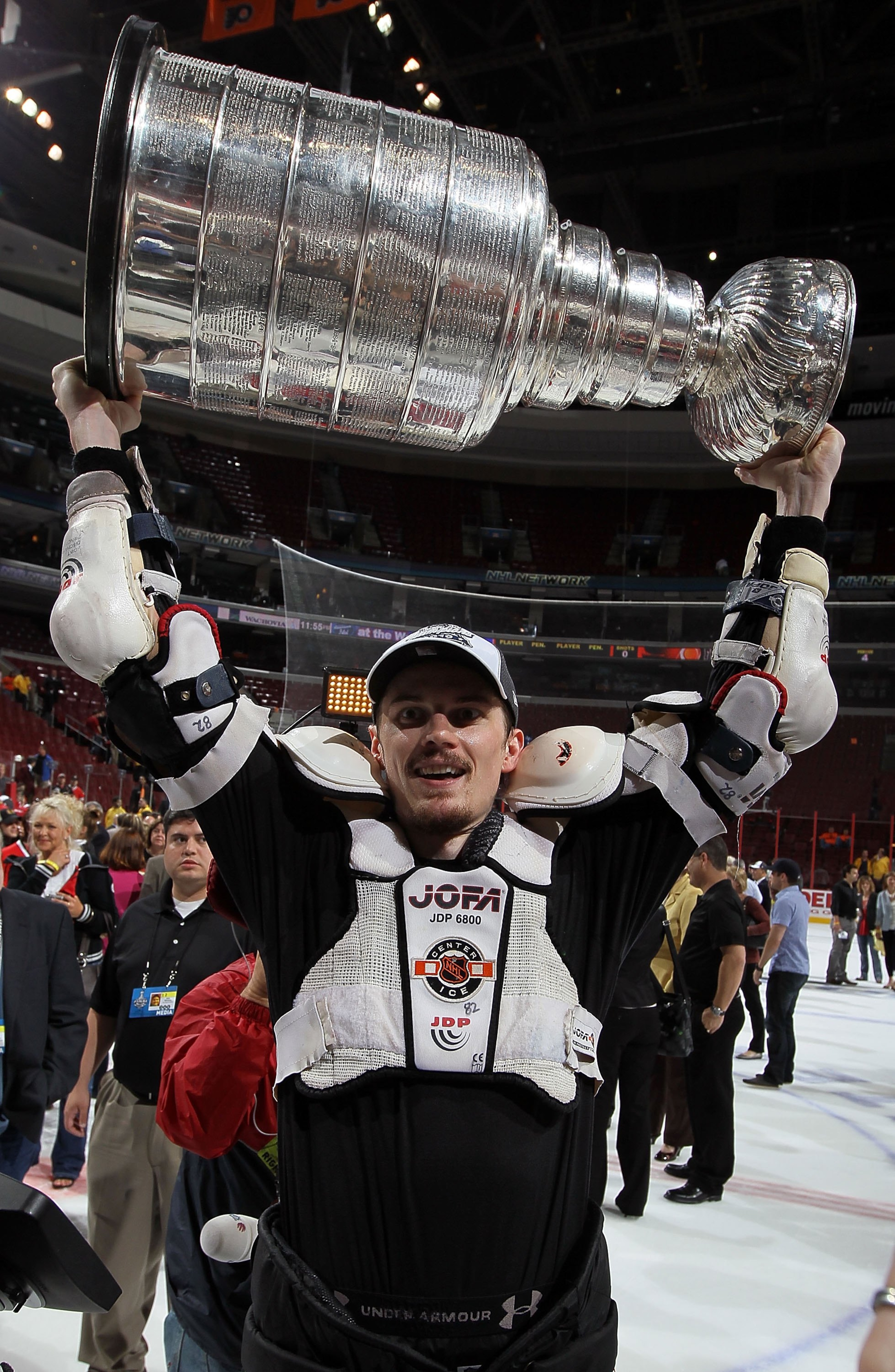 PHILADELPHIA - JUNE 09: Tomas Kopecky #82 of the Chicago Blackhawks hoists the Stanley Cup after teammate Patrick Kane scored the game-winning goal in overtime to defeat the Philadelphia Flyers 4-3 and win the Stanley Cup in Game Six of the 2010 NHL Stan PHILADELPHIA - JUNE 09: Tomas Kopecky #82 of the Chicago Blackhawks hoists the Stanley Cup after teammate Patrick Kane scored the game-winning goal in overtime to defeat the Philadelphia Flyers 4-3 and win the Stanley Cup in Game Six of the 2010 NHL Stan