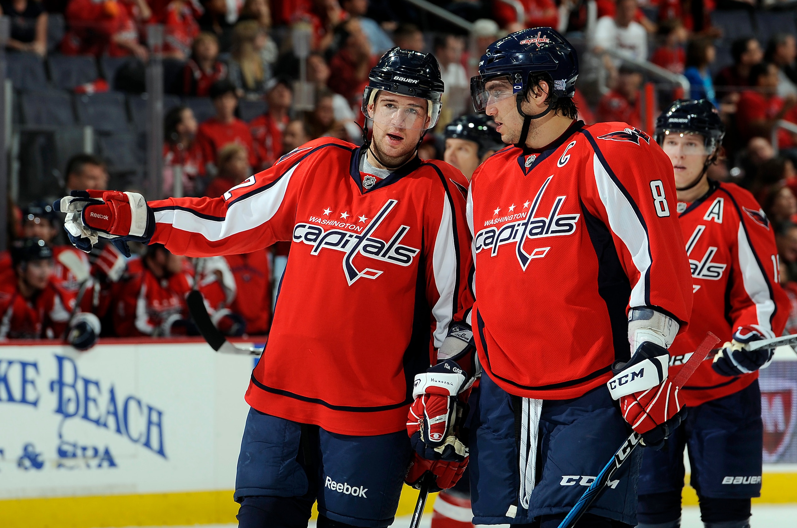 WASHINGTON - OCTOBER 11:  Mike Green #52 and Alex Ovechkin #8 of the Washington Capitals talk during the game against the Ottawa Senators at the Verizon Center on October 11, 2010 in Washington, DC.  (Photo by Greg Fiume/Getty Images)