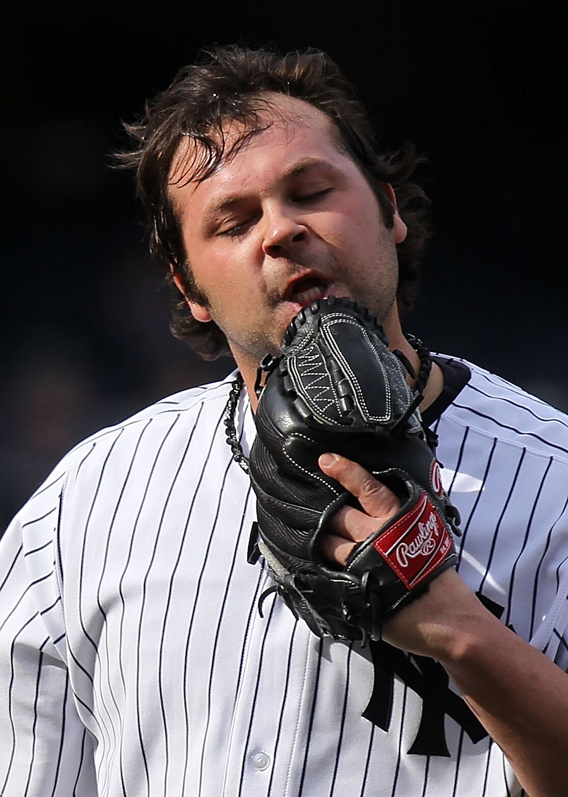 NEW YORK, NY - APRIL 03:  Joba Chamberlain #62 of the New York Yankees reacts walking back to the dugout in the ninth inning against the Detroit Tigers at Yankee Stadium on April 3, 2011 in the Bronx borough of New York City.  (Photo by Nick Laham/Getty I