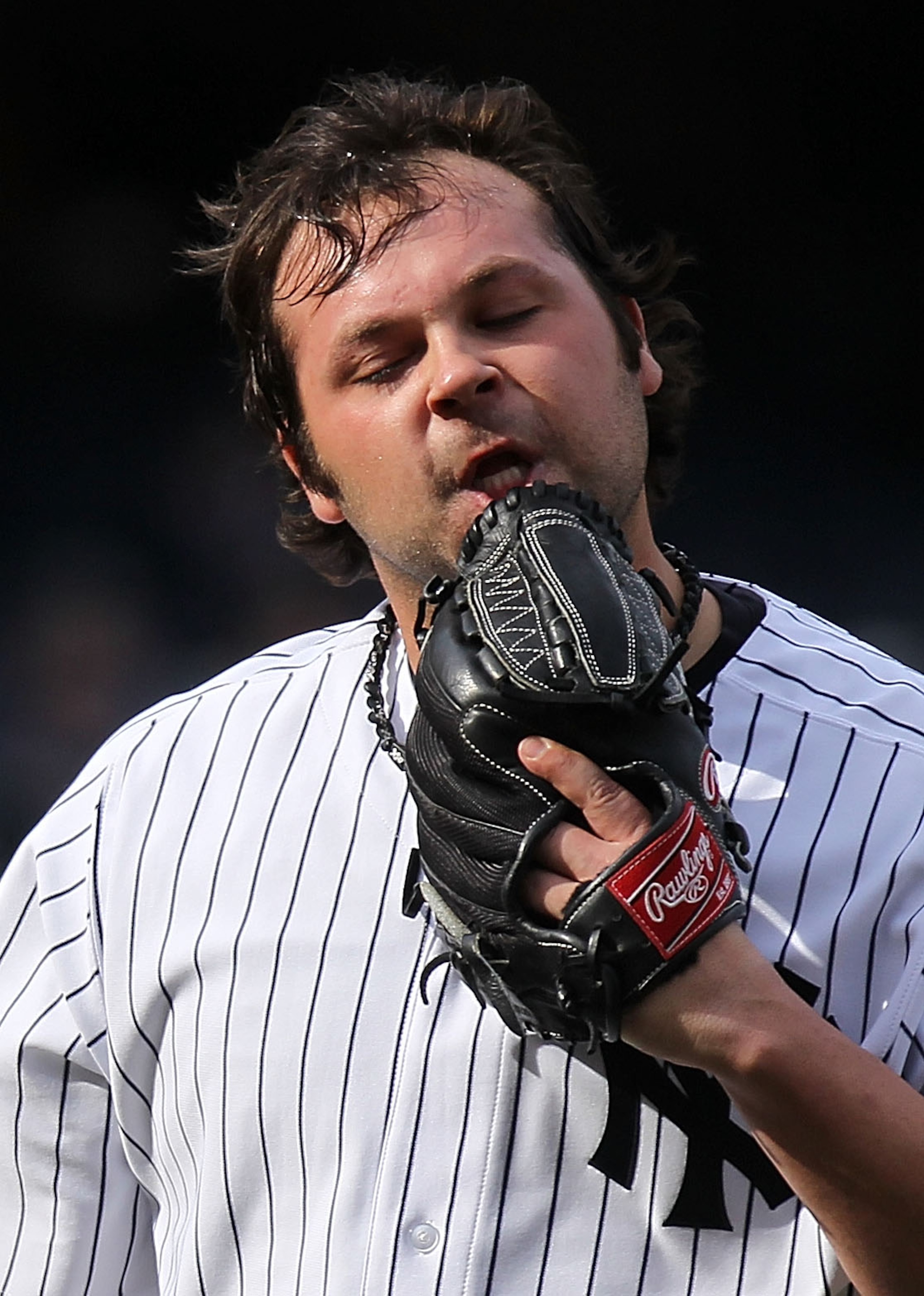 NEW YORK, NY - APRIL 03:  Joba Chamberlain #62 of the New York Yankees reacts walking back to the dugout in the ninth inning against the Detroit Tigers at Yankee Stadium on April 3, 2011 in the Bronx borough of New York City.  (Photo by Nick Laham/Getty I