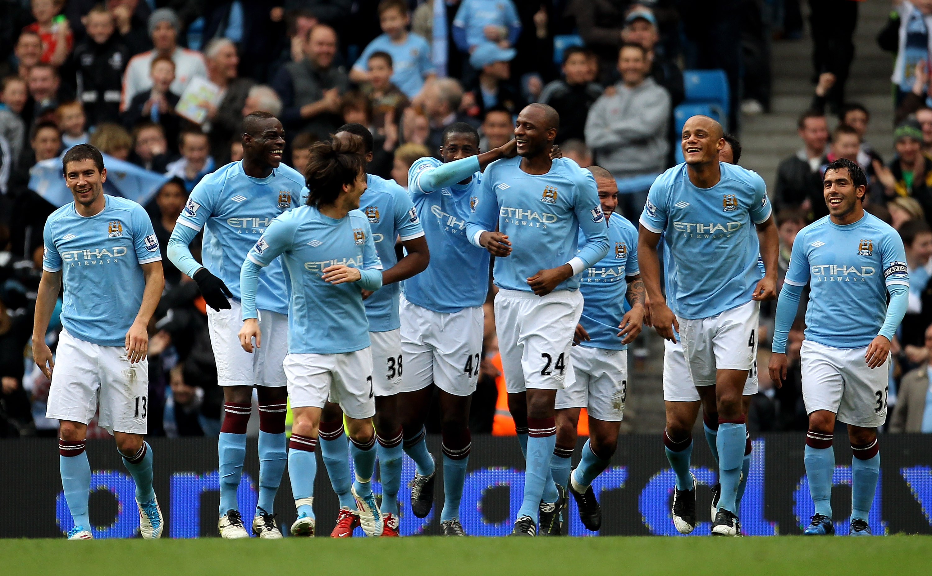 MANCHESTER, ENGLAND - APRIL 03:  Patrick Viera of Manchester City is congratulated by his team mates after scoring his team's fourth goal during the Barclays Premier League match between Manchester City and Sunderland at the City of Manchester Stadium on