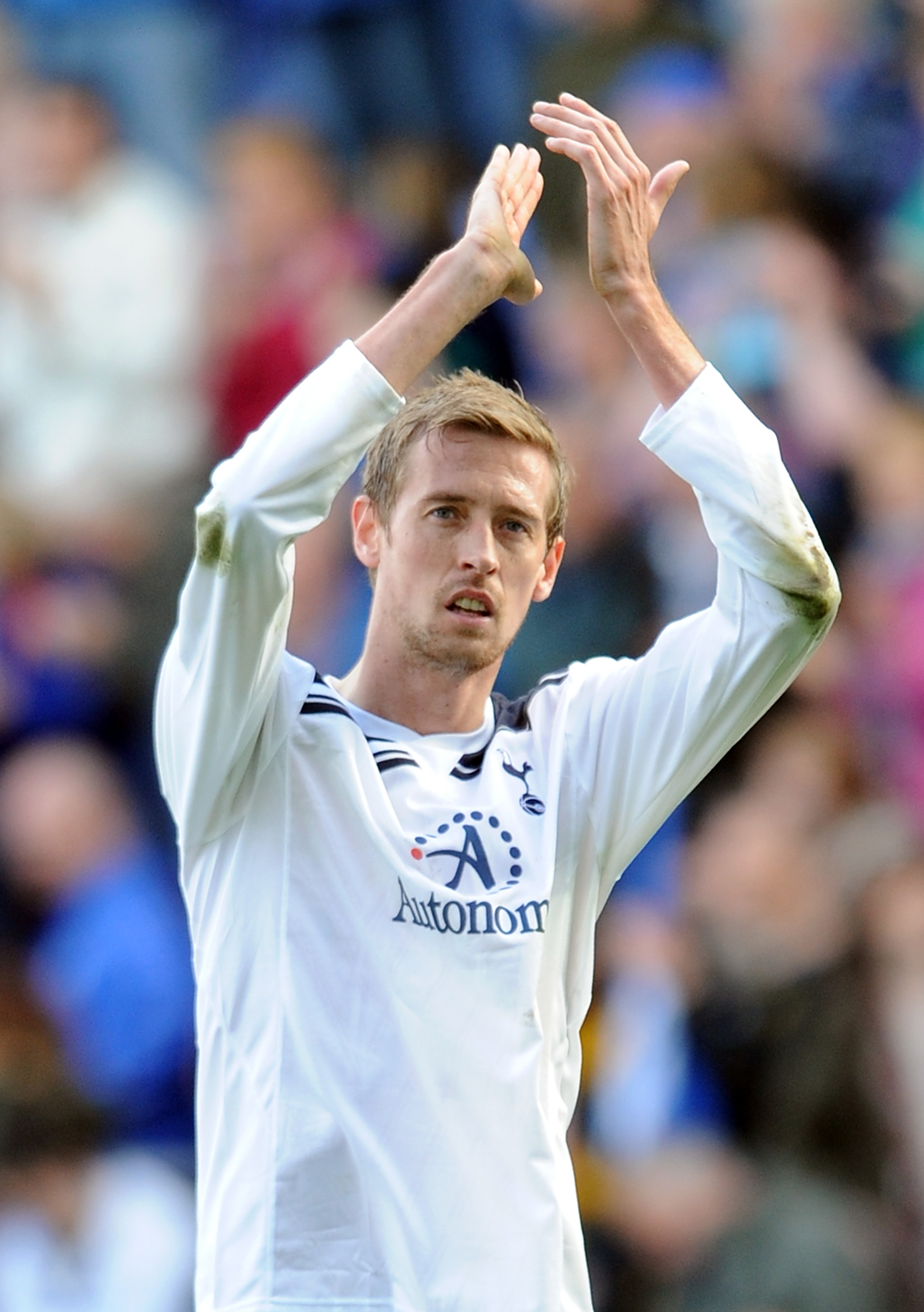 WIGAN, ENGLAND - APRIL 02: Peter Crouch of Tottenham Hotspur applauds the supporters following the Barclays Premier League match between Wigan Athletic and Tottenham Hotspur at DW Stadium on April 2, 2011 in Wigan, England.  (Photo by Chris Brunskill/Gett