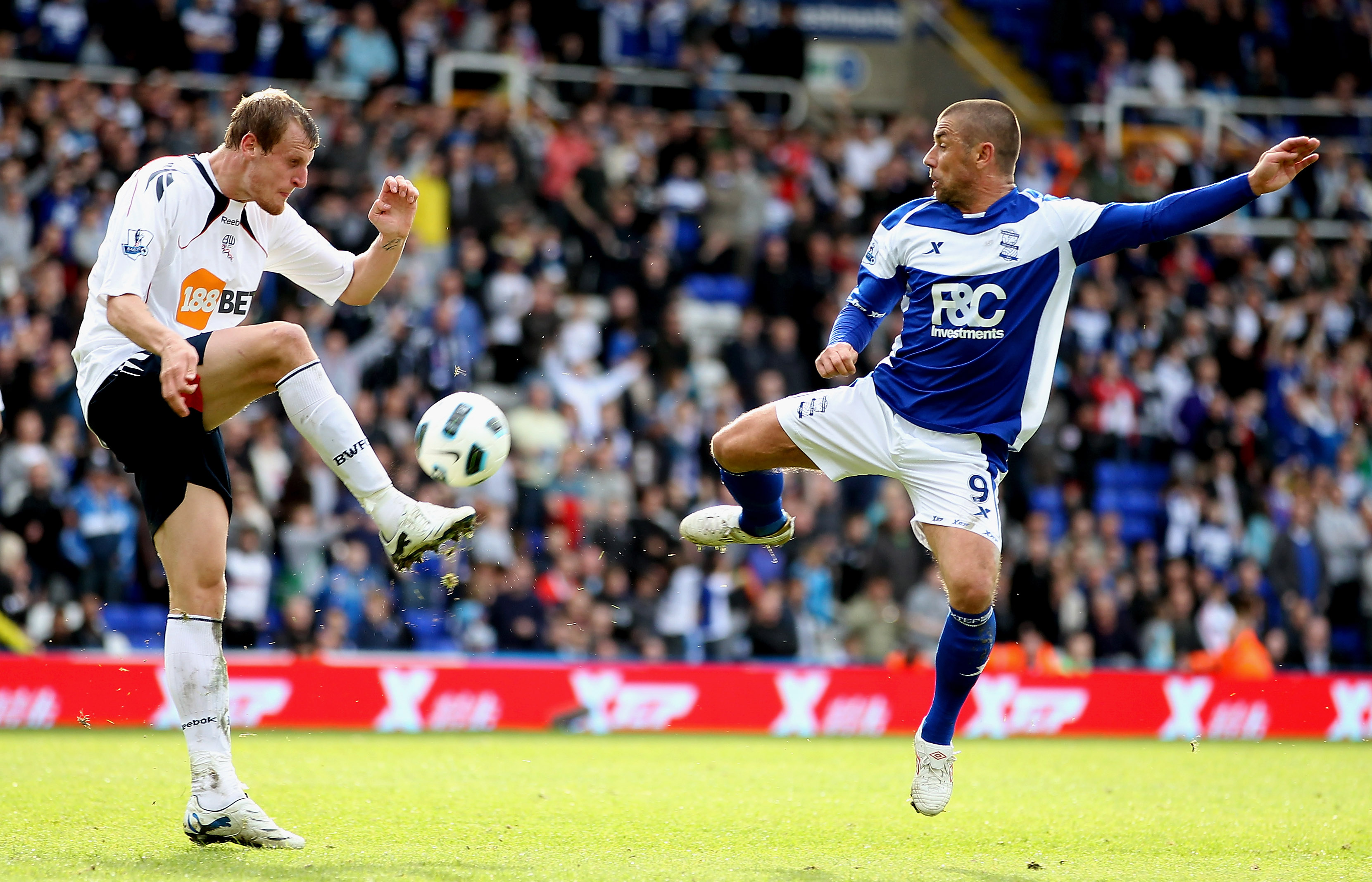 BIRMINGHAM, ENGLAND - APRIL 02:  David Wheater of Bolton (L) in action with Kevin Phillips of Birmingham during the Barclays Premier League match between Birmingham City and Bolton Wanderers at St.Andrews, on April 2, 2011 in Birmingham, England.  (Photo