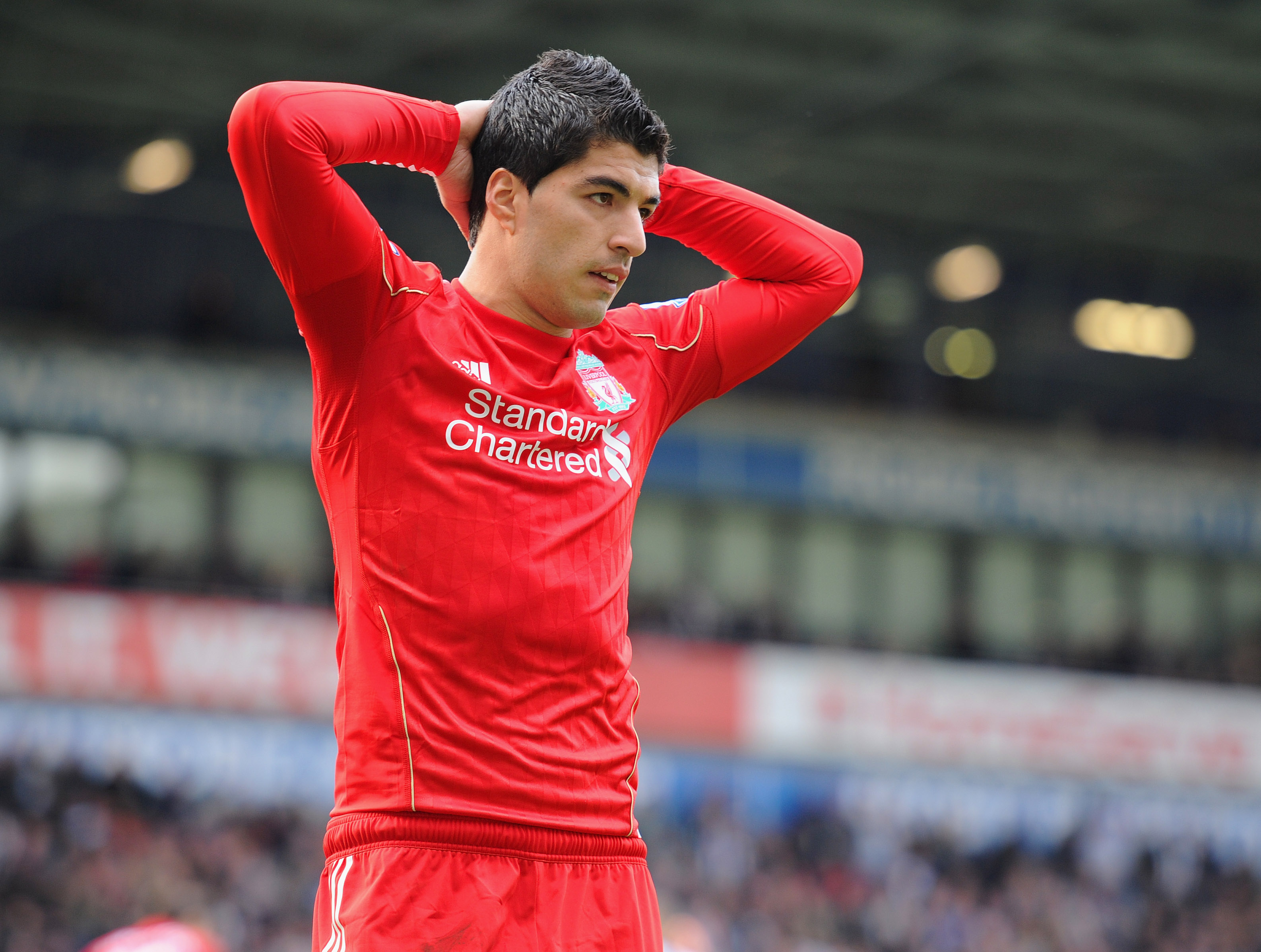 WEST BROMWICH, ENGLAND - APRIL 02: Luis Suarez of Liverpool looks dejected during the Barclays Premier League match between West Bromwich Albion and Liverpool at The Hawthorns on April 2, 2011 in West Bromwich, England.  (Photo by Michael Regan/Getty Imag
