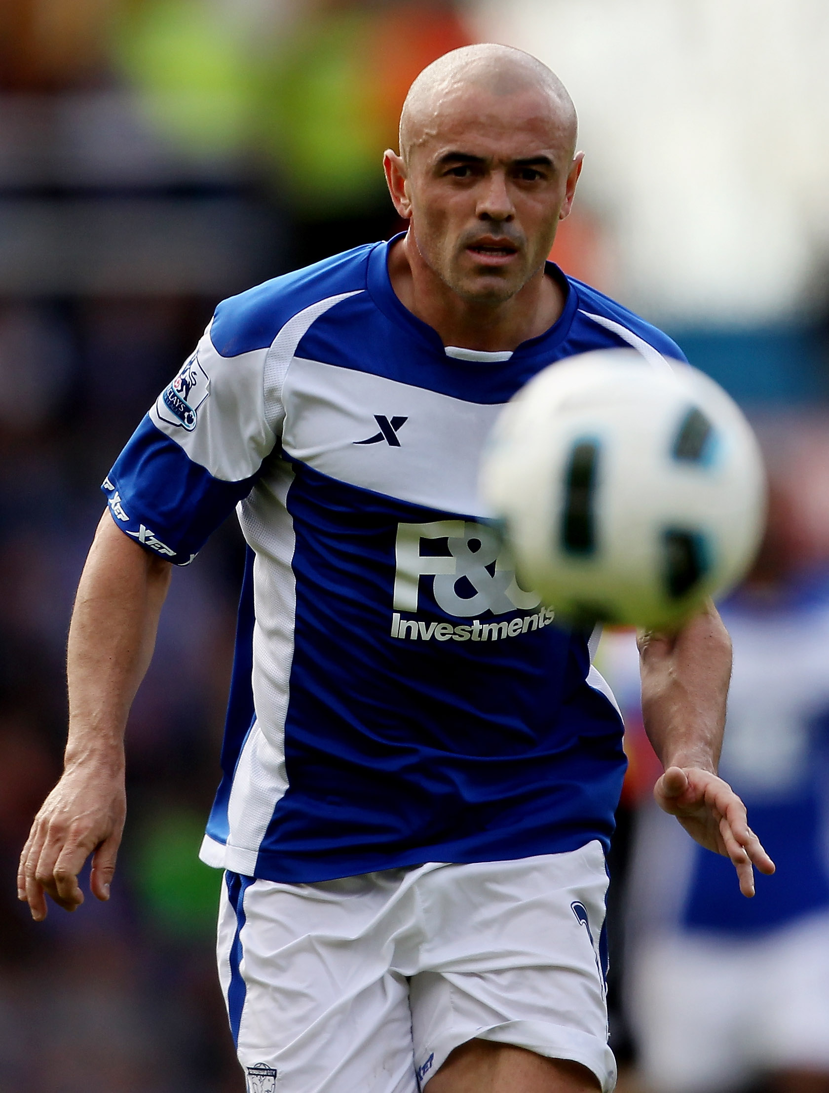 BIRMINGHAM, ENGLAND - APRIL 02:  Stephen Carr of Birmingham eyes the ball during the Barclays Premier League match between Birmingham City and Bolton Wanderers at St.Andrews on April 2, 2011 in Birmingham, England.  (Photo by Scott Heavey/Getty Images)