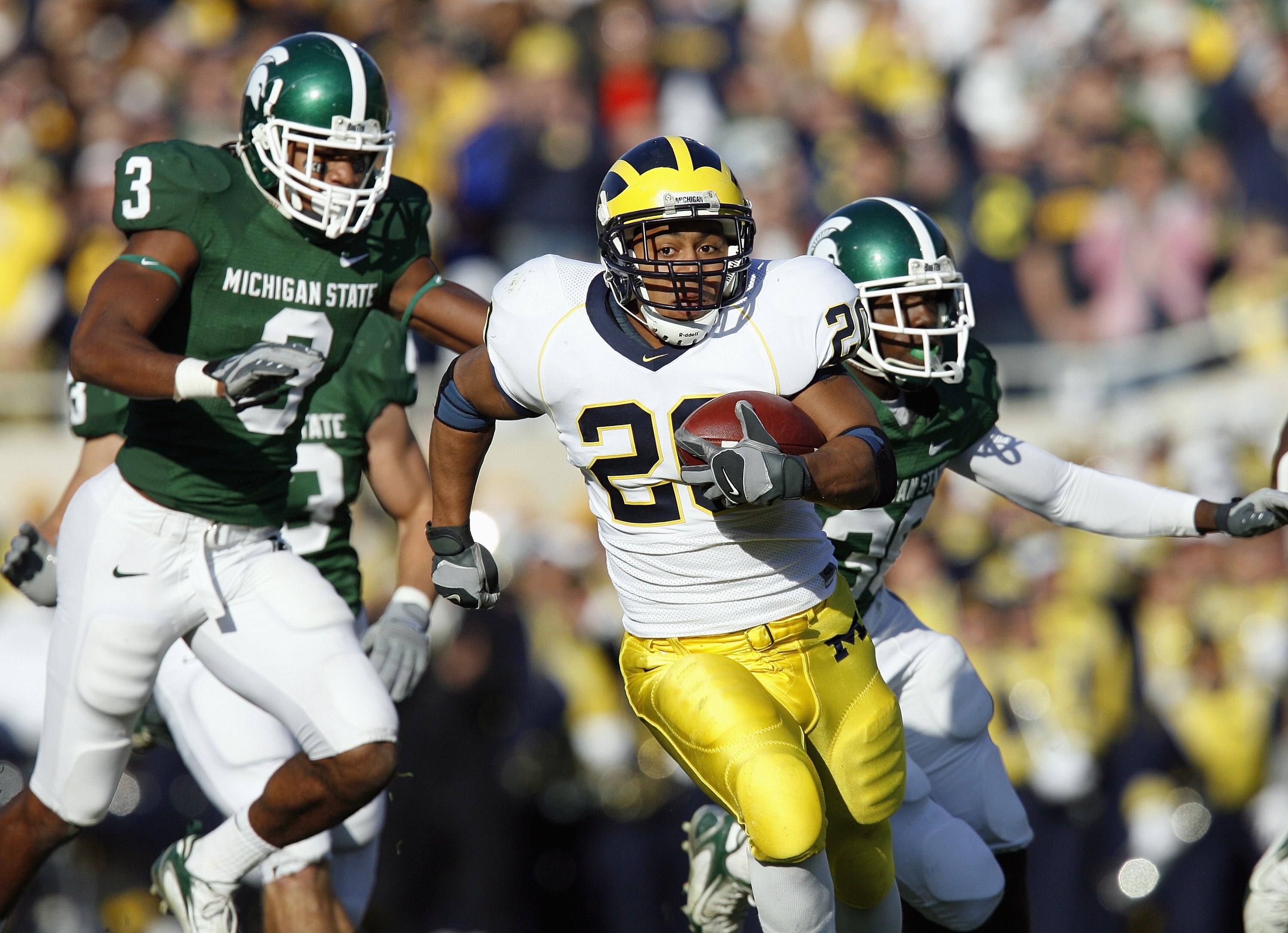 EAST LANSING, MI - NOVEMBER 3: Mike Hart #20 of the Michigan Wolverines carries the ball during the game against the Michigan State Spartans at Spartan Stadium November 3, 2007 in East Lansing, Michigan.  Michigan defeated Michigan State 28-24. (Photo by: