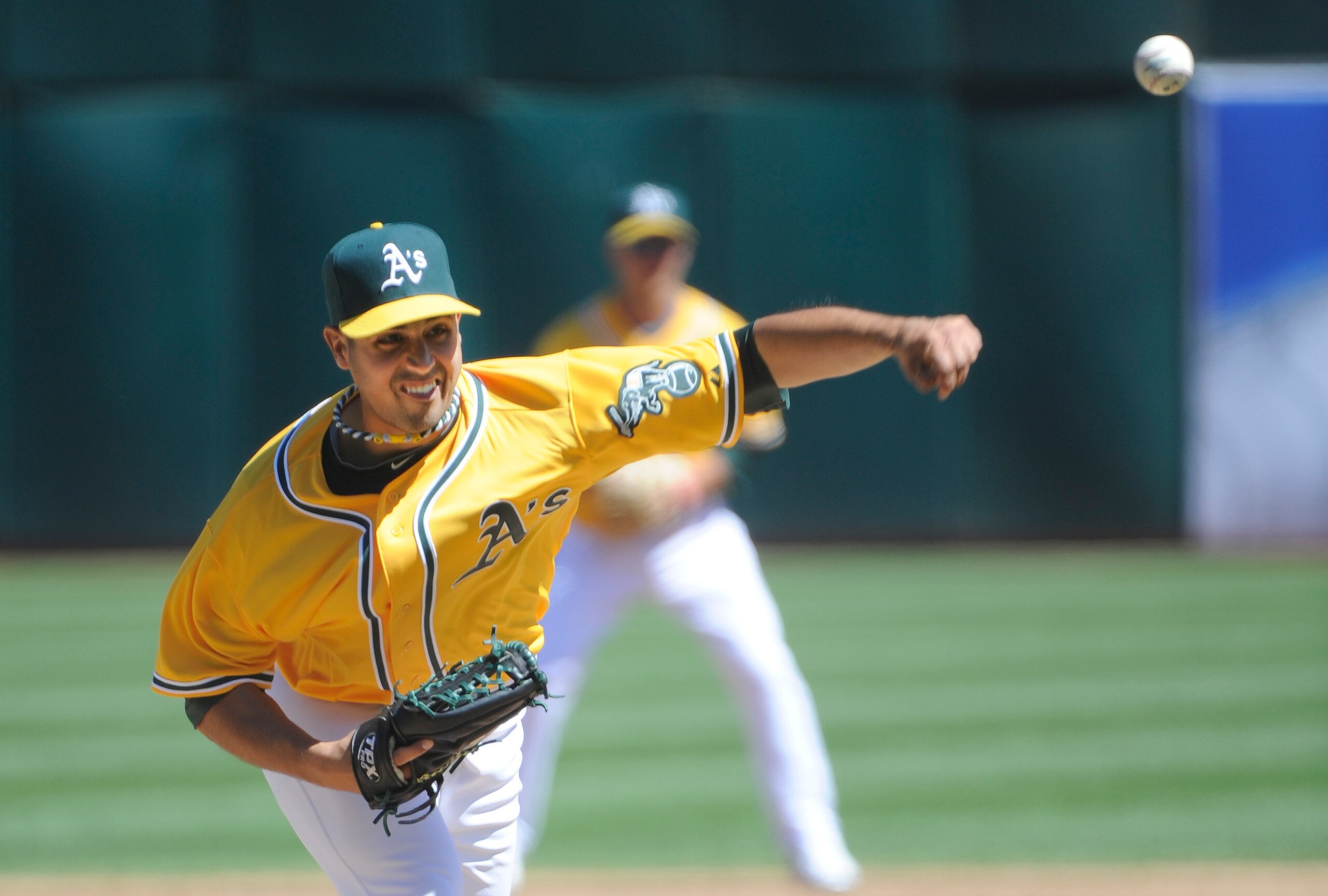 OAKLAND, CA - APRIL 3: Gio Gonzalez #47 of the Oakland Athletics pitches against the Seattle Mariners during a MLB baseball game at the Oakland-Alameda County Coliseum April 3, 2011 in Oakland, California.  (Photo by Thearon W. Henderson/Getty Images)
