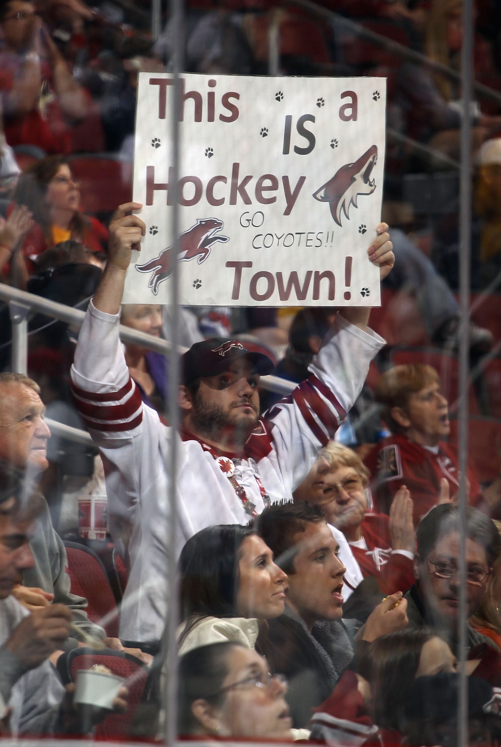 GLENDALE, AZ - MARCH 29:  Fans of the Phoenix Coyotes hold up a sign during the NHL game against the Dallas Stars at Jobing.com Arena on March 29, 2011 in Glendale, Arizona.  The Coyotes defeated the Stars 2-1 in an overtime shoot out.  (Photo by Christia