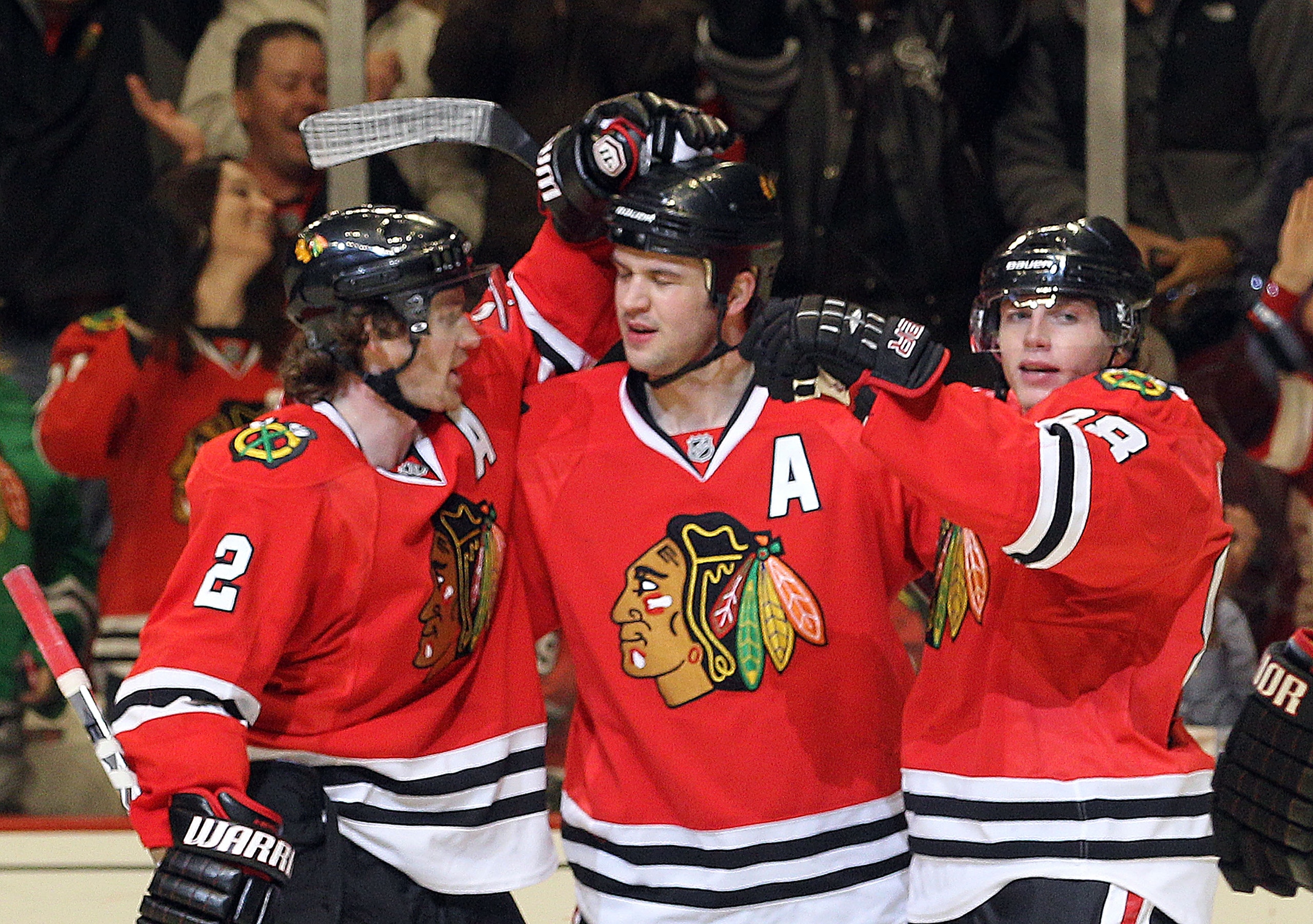 CHICAGO, IL - MARCH 23: Brent Seabrook #7 of the Chicago Blackhawks scores at 14:41 of the second period against the Florida Panthers and is joined by Duncan Keith #2 (L) and Patrick Kane #88 (R) at the United Center on March 23, 2011 in Chicago, Illinois CHICAGO, IL - MARCH 23: Brent Seabrook #7 of the Chicago Blackhawks scores at 14:41 of the second period against the Florida Panthers and is joined by Duncan Keith #2 (L) and Patrick Kane #88 (R) at the United Center on March 23, 2011 in Chicago, Illinois
