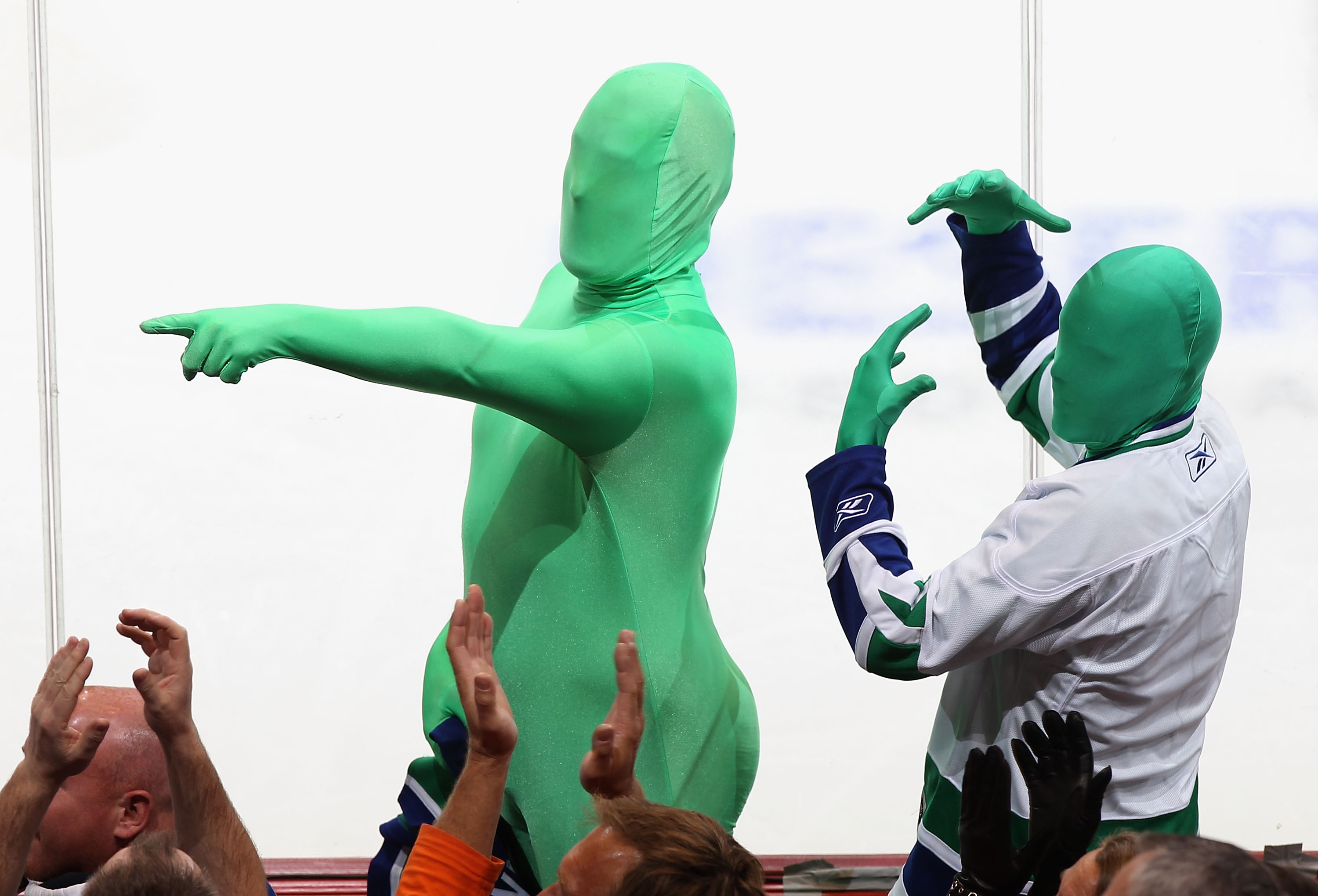 GLENDALE, AZ - FEBRUARY 02:  Fans of the Vancouver Canucks, Force and Sully, perform during the NHL game against the Phoenix Coyotes at Jobing.com Arena on February 2, 2011 in Glendale, Arizona.  The Canucks defeated the Coyotes 6-0. (Photo by Christian P