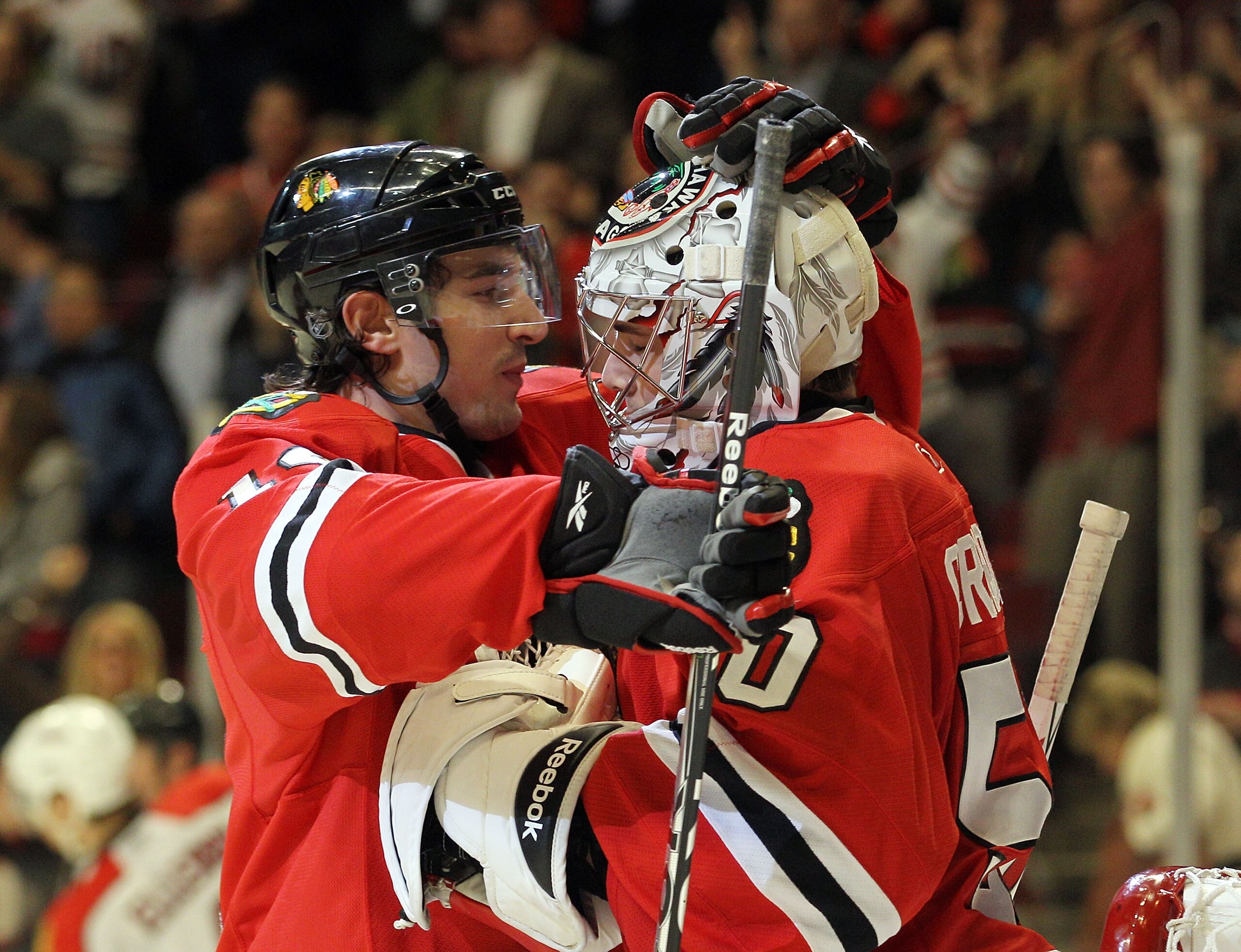 CHICAGO, IL - MARCH 23: Chris Campoli #14 and Corey Crawford #50 of the Chicago Blackhawks celebrate their win over the Florida Panthers at the United Center on March 23, 2011 in Chicago, Illinois. The Blackhawks defeated the Panthers 4-0. (Photo by Bruc CHICAGO, IL - MARCH 23: Chris Campoli #14 and Corey Crawford #50 of the Chicago Blackhawks celebrate their win over the Florida Panthers at the United Center on March 23, 2011 in Chicago, Illinois. The Blackhawks defeated the Panthers 4-0. (Photo by Bruc