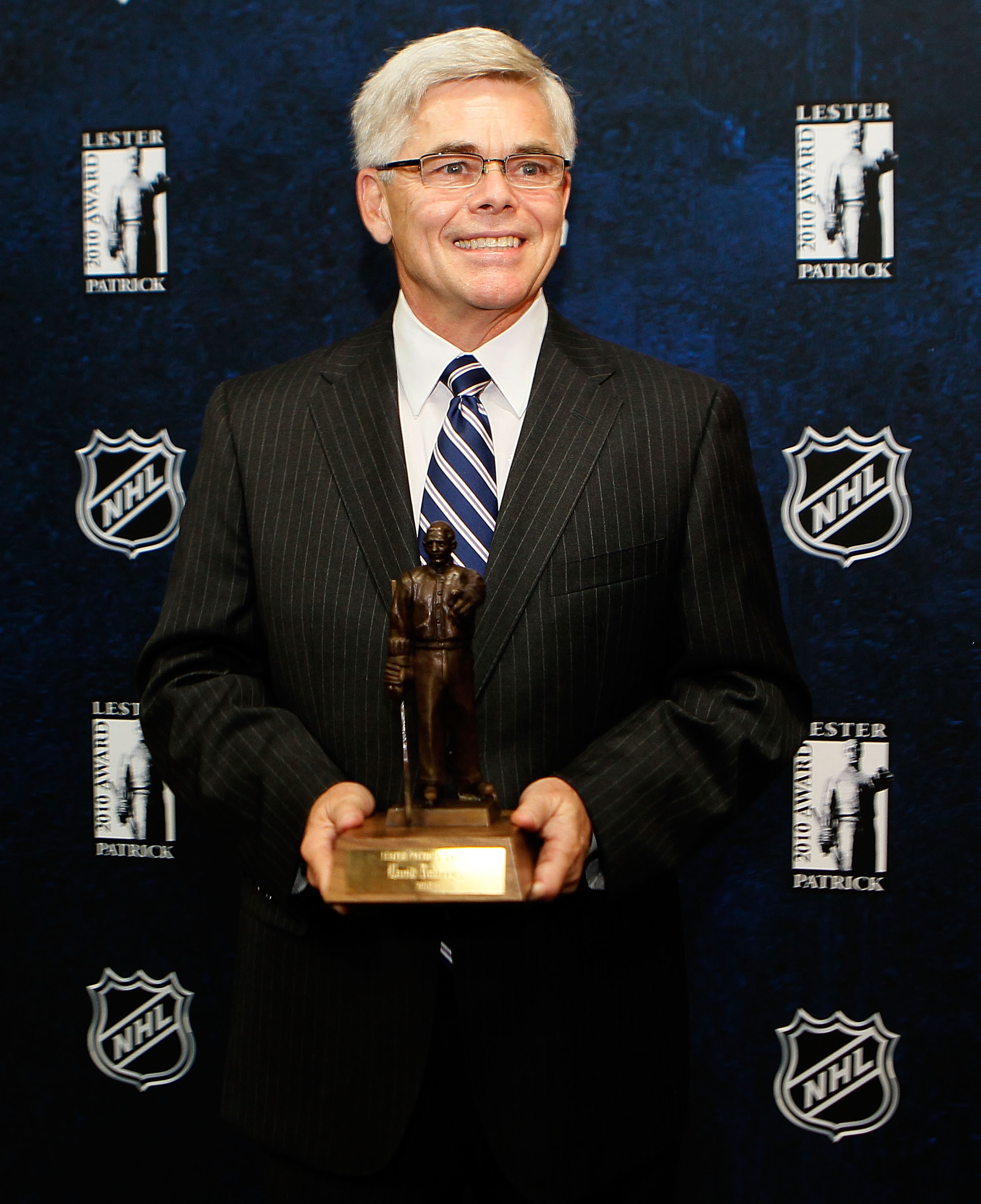 BOSTON - OCTOBER 27:  David Andrews, president of the American Hockey League,  stands with his 2010 Lester Patrick Trophy on hand for an afternoon media availability at TD Garden on October 27, 2010 in Boston, Massachusetts. NOTE TO USER: User expressly a