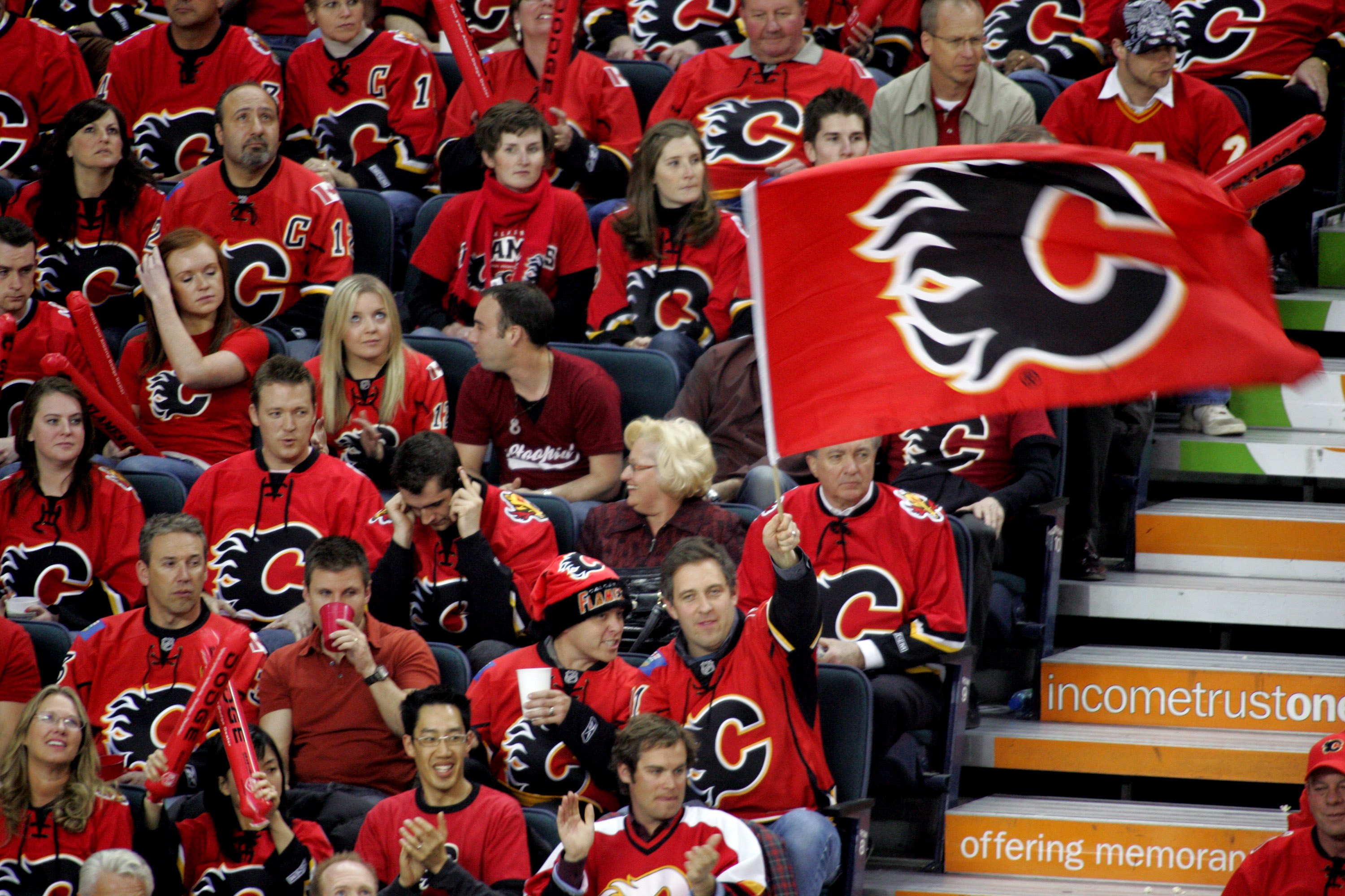 CALGARY, CANADA - APRIL 15:  Fans of the Calgary Flames form a'Seas of Red' to support their team against the San Jose Sharks during game four of the Western Conference Quarterfinals of the 2008 NHL Stanley Cup Playoffs at Pengrowth Saddledome on April 15