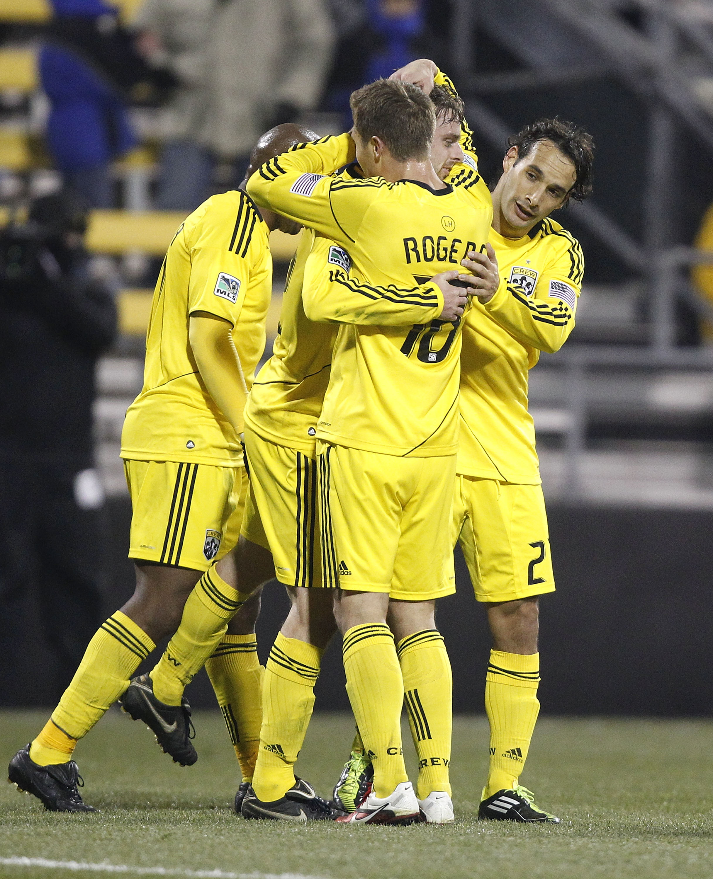 COLUMBUS, OH - APRIL 01:  Eddie Gaven #12 of the Columbus Crew celebrates with Robbie Rogers #18 and Rich Balchan #2 after scoring a goal against FC Dallas at Crew Stadium on April 1, 2011 in Columbus, Ohio.  (Photo by Matt Sullivan/Getty Images)