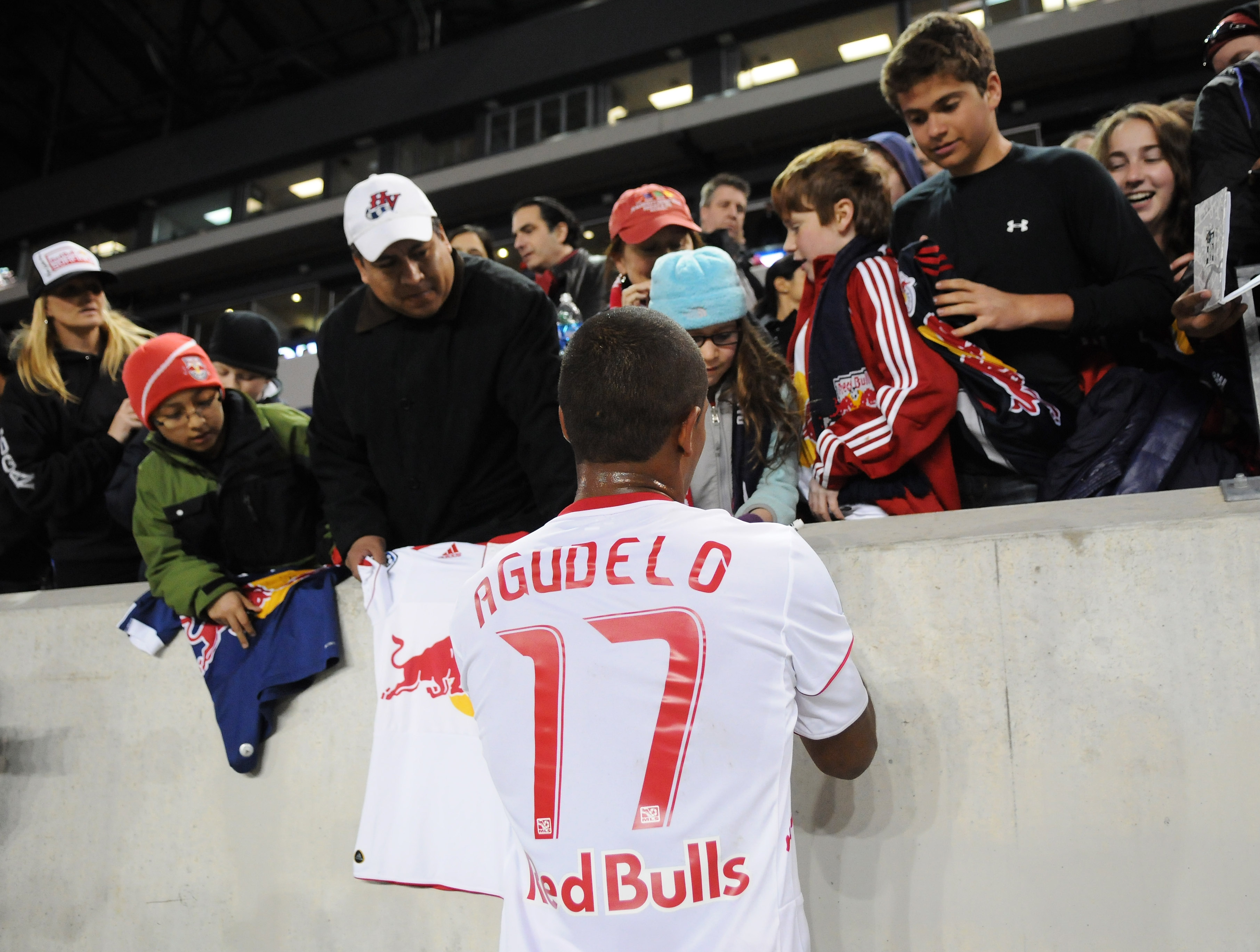HARRISON, NJ - APRIL 02:  Juan Agudelo #17 of the New York Red Bulls signs autographs after their game against the Houston Dynamo at Red Bull Arena on April 2, 2011 in Harrison, New Jersey.  (Photo by Jonathan Fickies/Getty Images for New York Red Bulls)