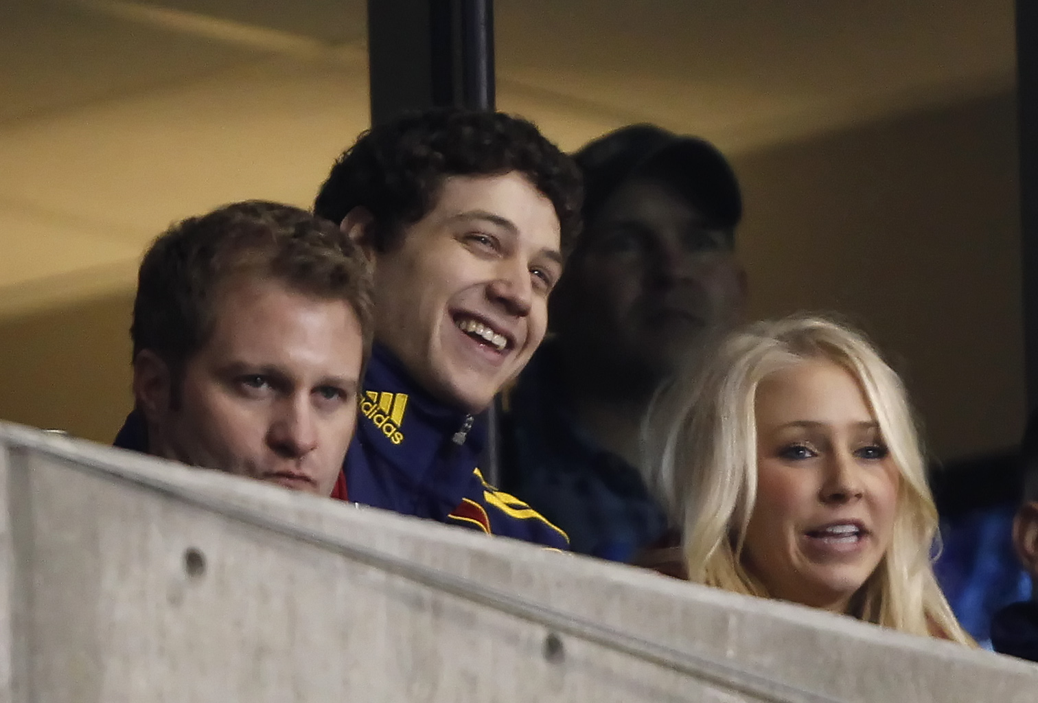 SANDY, UT - MARCH 26: Former BYU basketball player Jimmer Fredette (C) smiles with his girlfriend Whitney Wonnacott (R) during a game against Real Salt Lake and the Los Angeles Galaxy during the second half of an MLS soccer game March 26, 2011 at Rio Tint