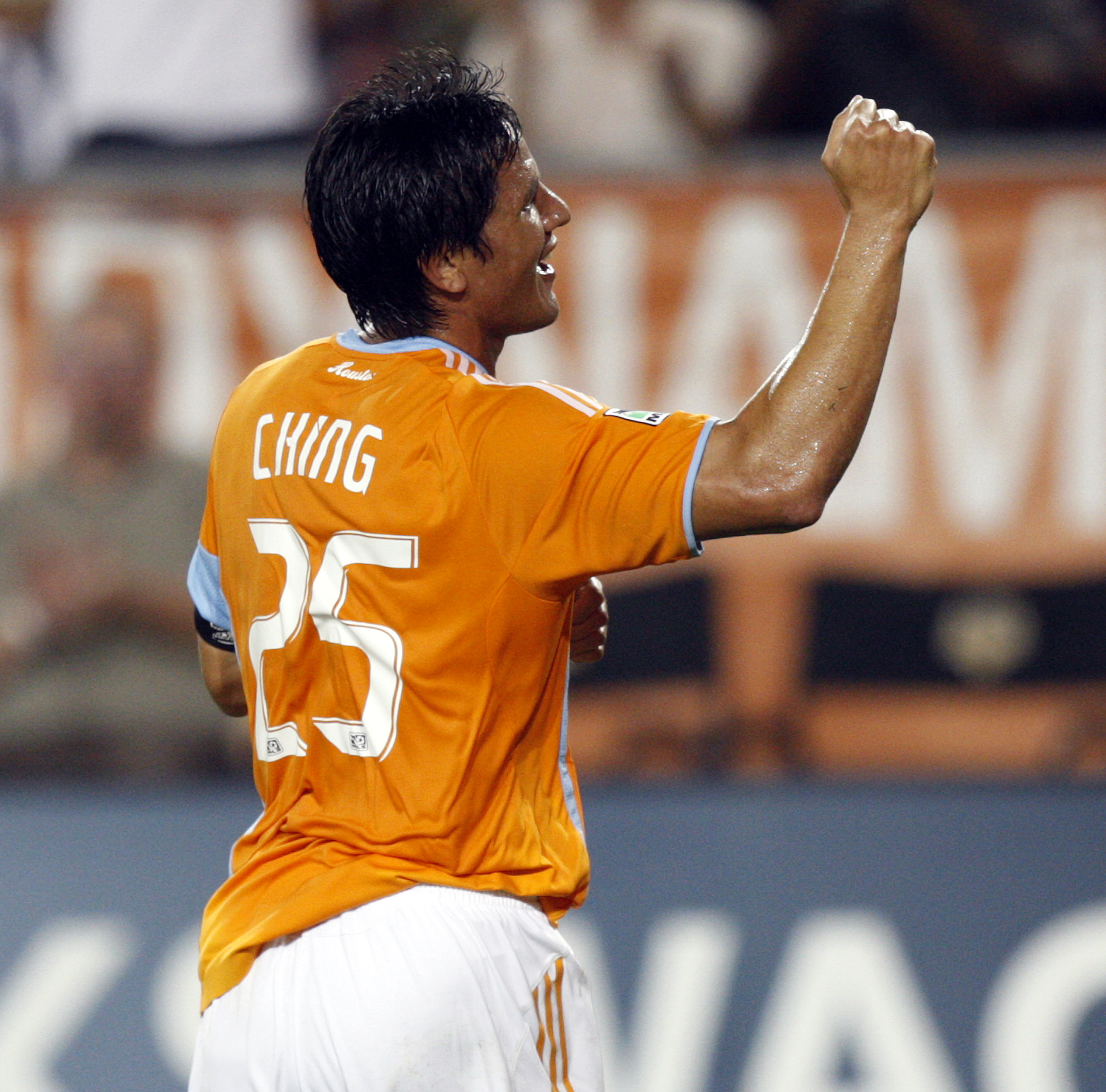 HOUSTON - SEPTEMBER 18:  Brian Ching #25 of the Houston Dynamo celebrates after scoring on a header in the 18th minute against Toronto FC at Robertson Stadium on September 18, 2010 in Houston, Texas.  (Photo by Bob Levey/Getty Images)