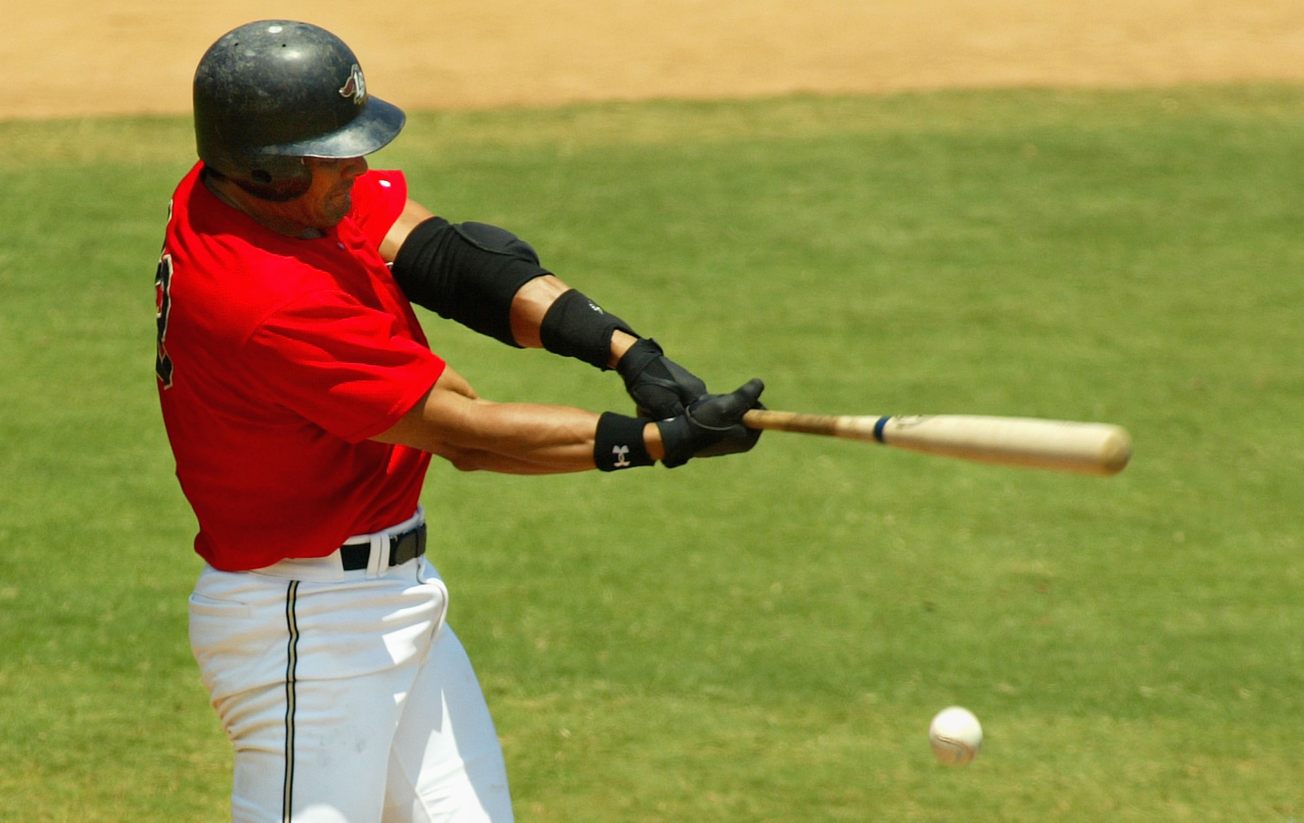 LONG BEACH, CA - JULY 16:  Jose Canseco #33 of the Long Beach Armada swings at a strike pitch in the Golden Baseball League game against the Fullerton Flyers on July 16, 2006 at Blair Field in Long Beach, California.  (Photo By Christian Petersen/Getty Im