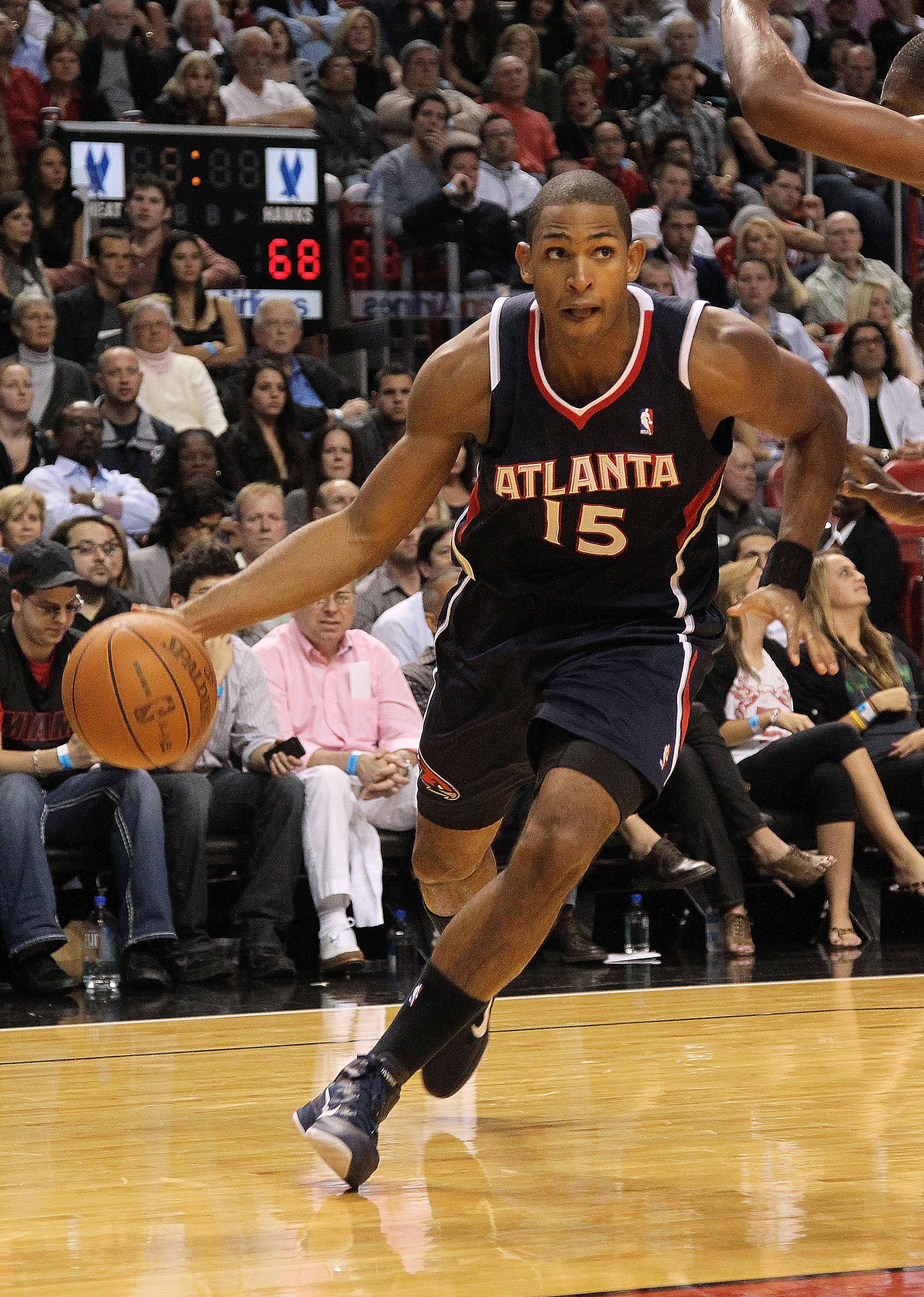 MIAMI, FL - DECEMBER 04: Al Horford #15 of the Atlanta Hawks drives to the basket during a game against the Miami Heat at American Airlines Arena on December 4, 2010 in Miami, Florida. NOTE TO USER: User expressly acknowledges and agrees that, by downloa MIAMI, FL - DECEMBER 04: Al Horford #15 of the Atlanta Hawks drives to the basket during a game against the Miami Heat at American Airlines Arena on December 4, 2010 in Miami, Florida. NOTE TO USER: User expressly acknowledges and agrees that, by downloa