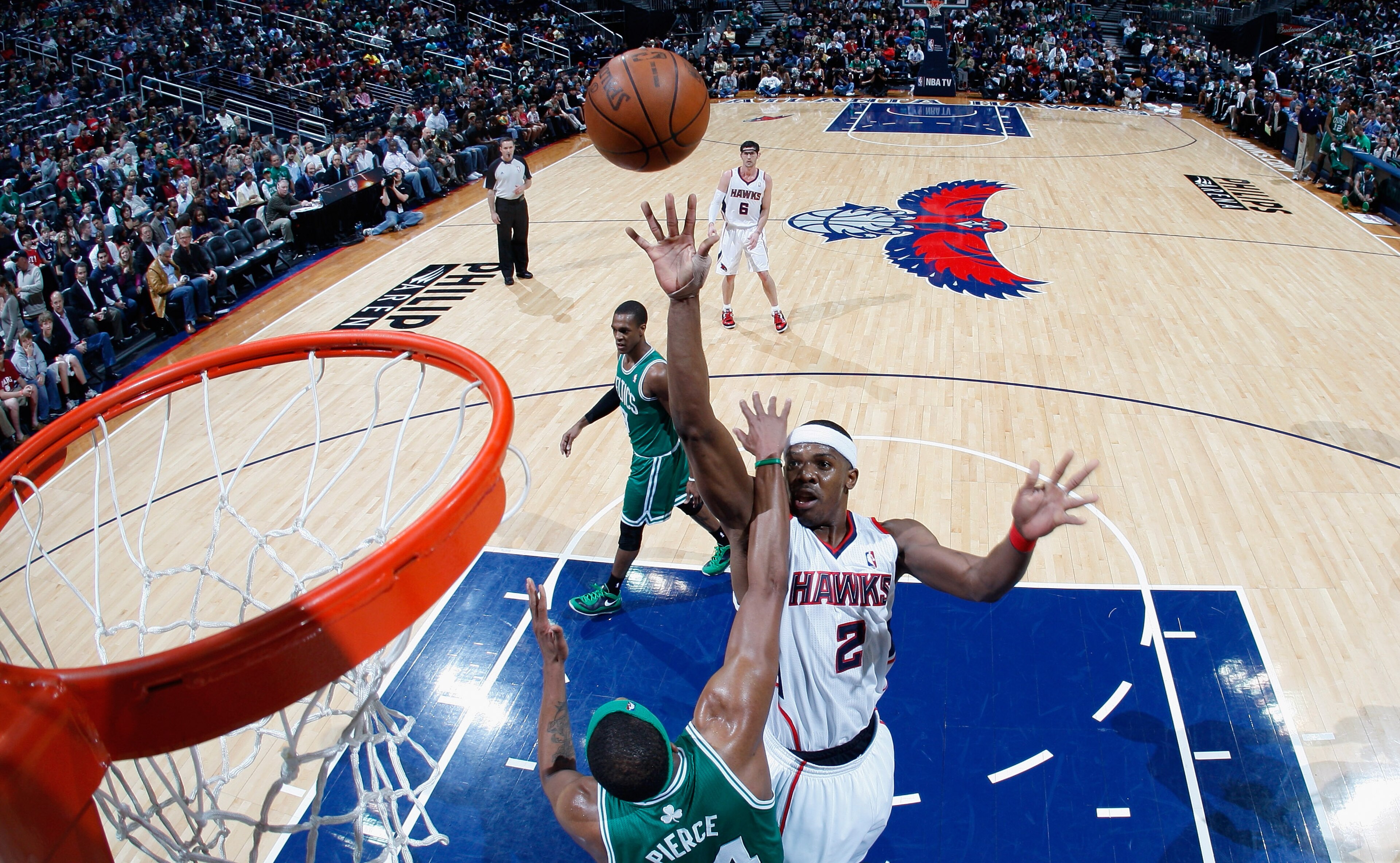 ATLANTA, GA - APRIL 01: Paul Pierce #34 of the Boston Celtics defends against Joe Johnson #2 of the Atlanta Hawks at Philips Arena on April 1, 2011 in Atlanta, Georgia. NOTE TO USER: User expressly acknowledges and agrees that, by downloading and/or usi ATLANTA, GA - APRIL 01: Paul Pierce #34 of the Boston Celtics defends against Joe Johnson #2 of the Atlanta Hawks at Philips Arena on April 1, 2011 in Atlanta, Georgia. NOTE TO USER: User expressly acknowledges and agrees that, by downloading and/or usi