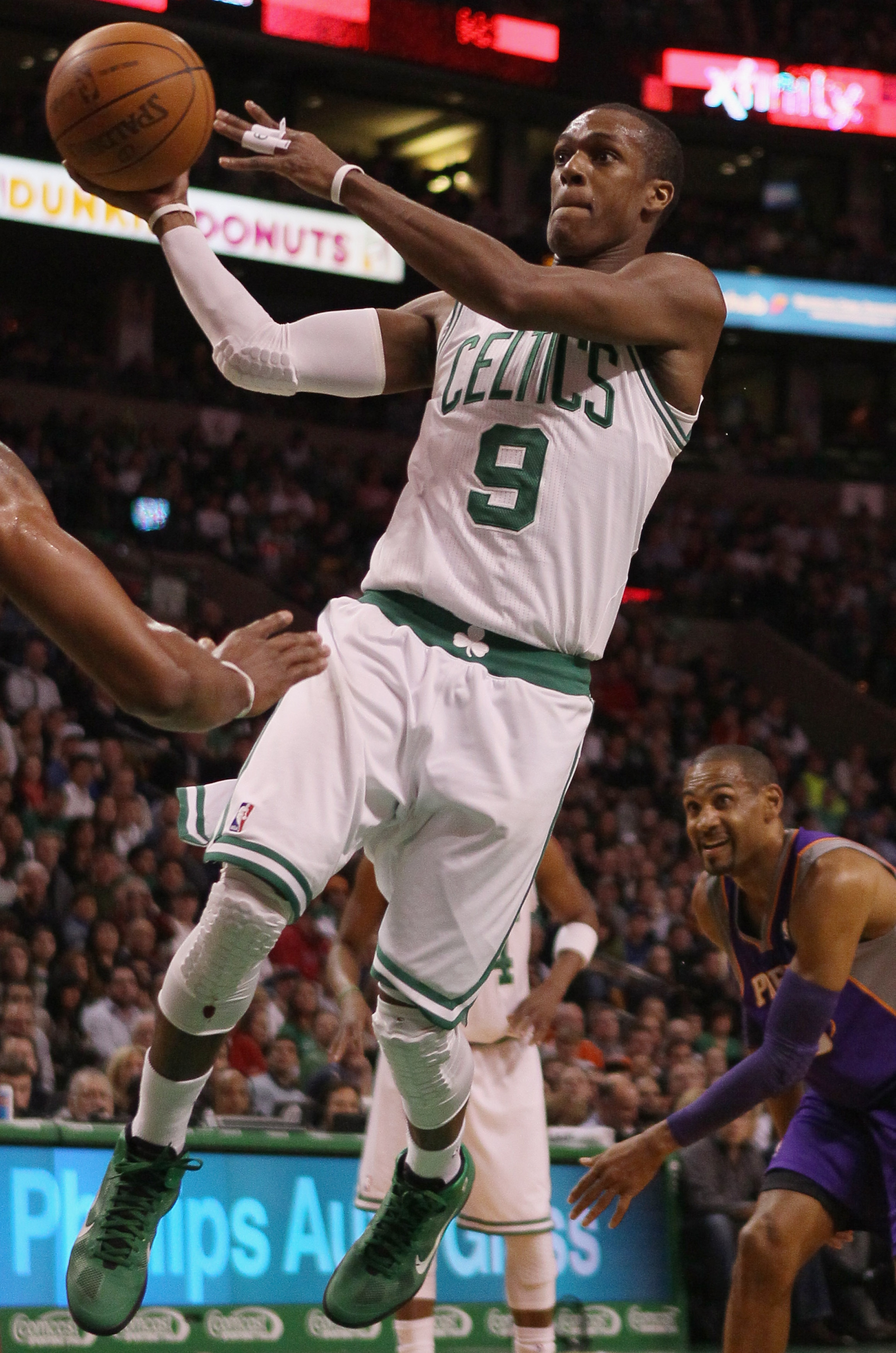 BOSTON, MA - MARCH 02: Rajon Rondo #9 of the Boston Celtics heads for the basket as Grant Hill #33 of the Phoenix Suns defends on March 2, 2011 at the TD Garden in Boston, Massachusetts. NOTE TO USER: User expressly acknowledges and agrees that, by down BOSTON, MA - MARCH 02: Rajon Rondo #9 of the Boston Celtics heads for the basket as Grant Hill #33 of the Phoenix Suns defends on March 2, 2011 at the TD Garden in Boston, Massachusetts. NOTE TO USER: User expressly acknowledges and agrees that, by down