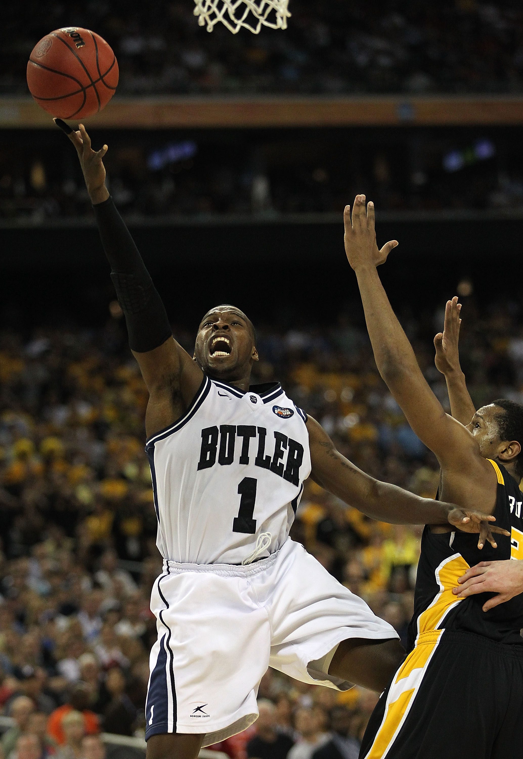 HOUSTON, TX - APRIL 02: Shelvin Mack #1 of the Butler Bulldogs goes to the hoop against Virginia Commonwealth Rams during the National Semifinal game of the 2011 NCAA Division I Men's Basketball Championship at Reliant Stadium on April 2, 2011 in Houston
