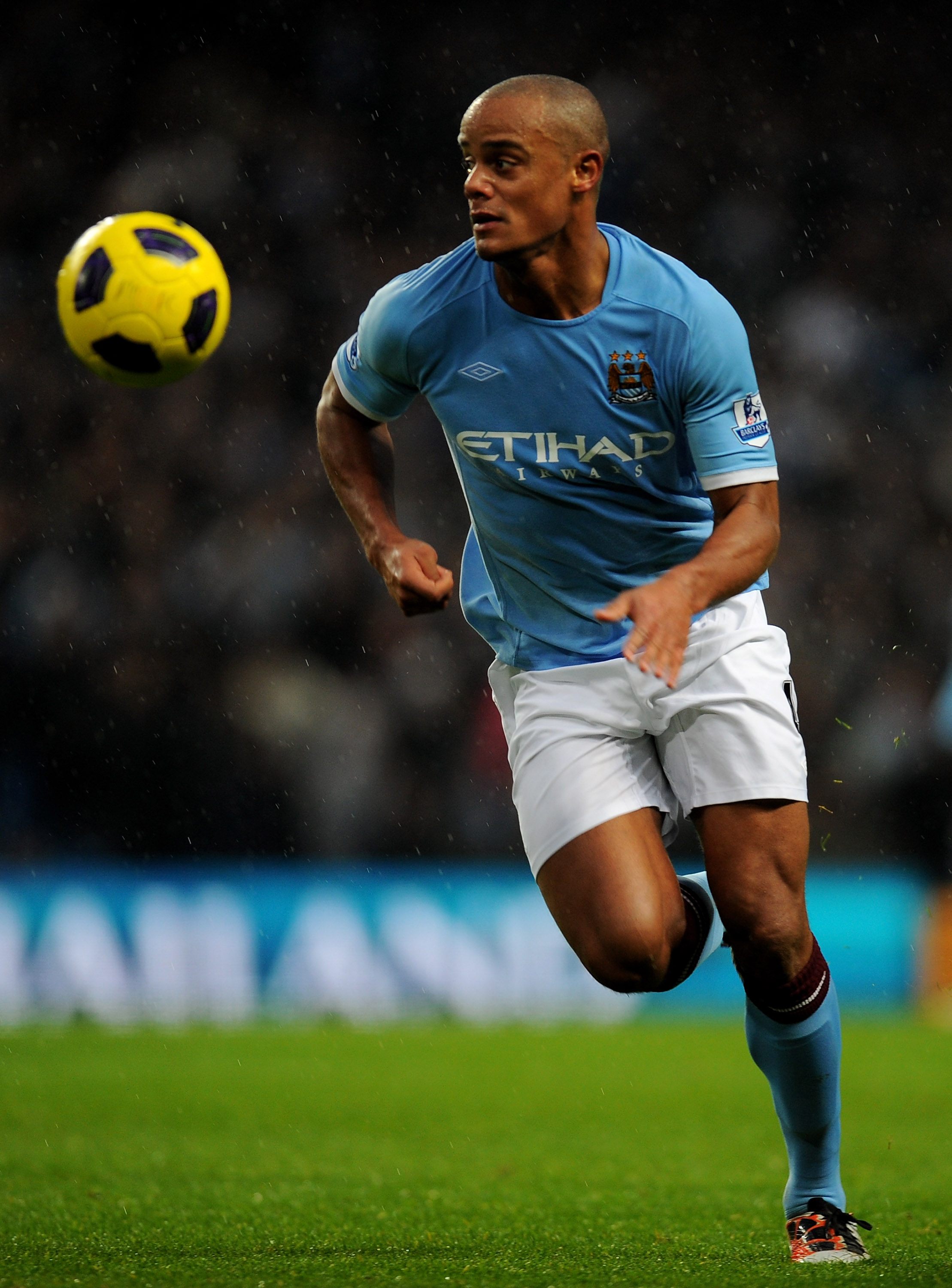 MANCHESTER, ENGLAND - DECEMBER 04:   Vincent Kompany of Manchester City in action during the Barclays Premier League match between Manchester City and Bolton Wanderers at the City of Manchester Stadium on December 4, 2010 in Manchester, England.  (Photo b