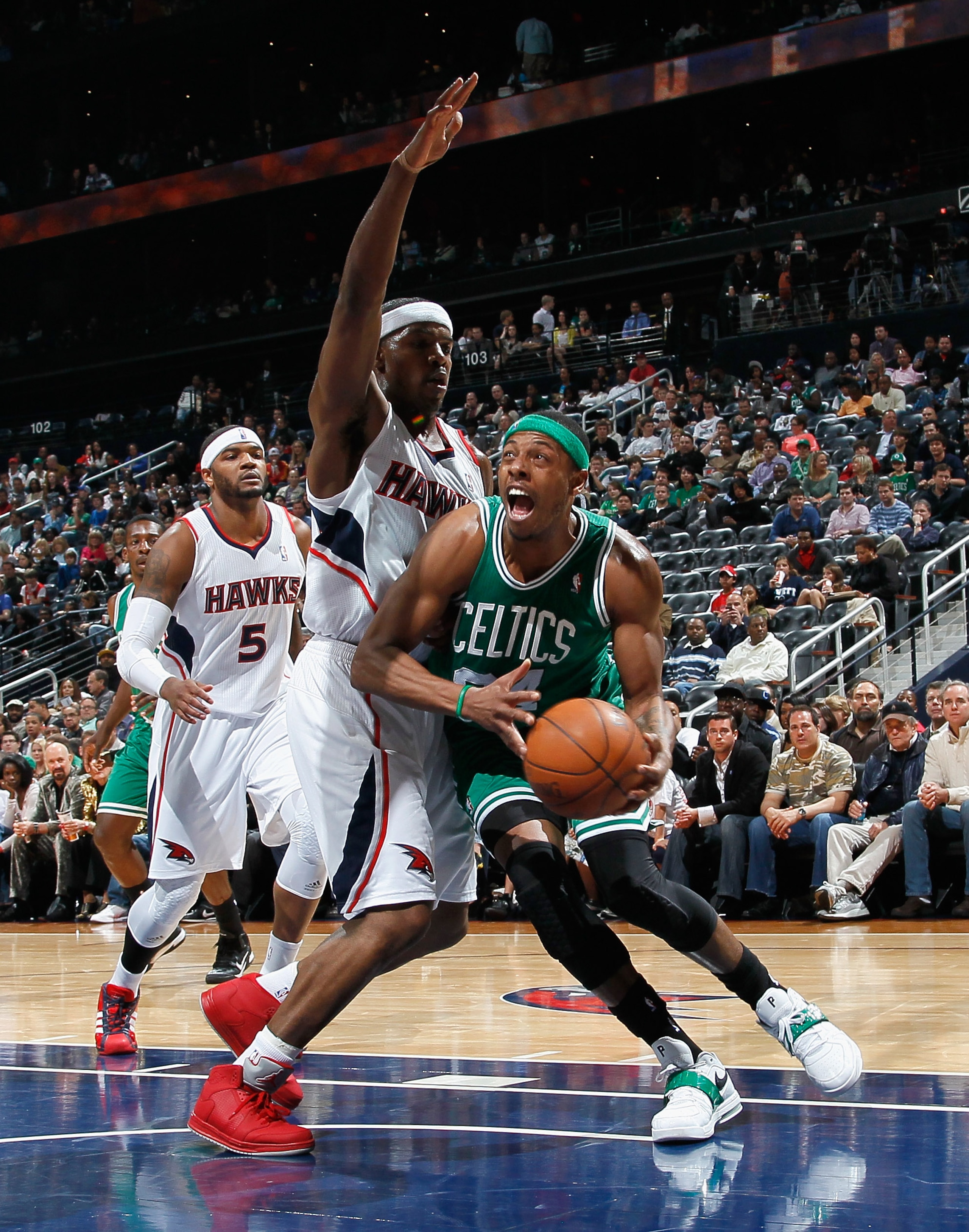 ATLANTA, GA - APRIL 01:  Paul Pierce #34 of the Boston Celtics drives to the basket against Joe Johnson #2 of the Atlanta Hawks at Philips Arena on April 1, 2011 in Atlanta, Georgia.  NOTE TO USER: User expressly acknowledges and agrees that, by downloadi
