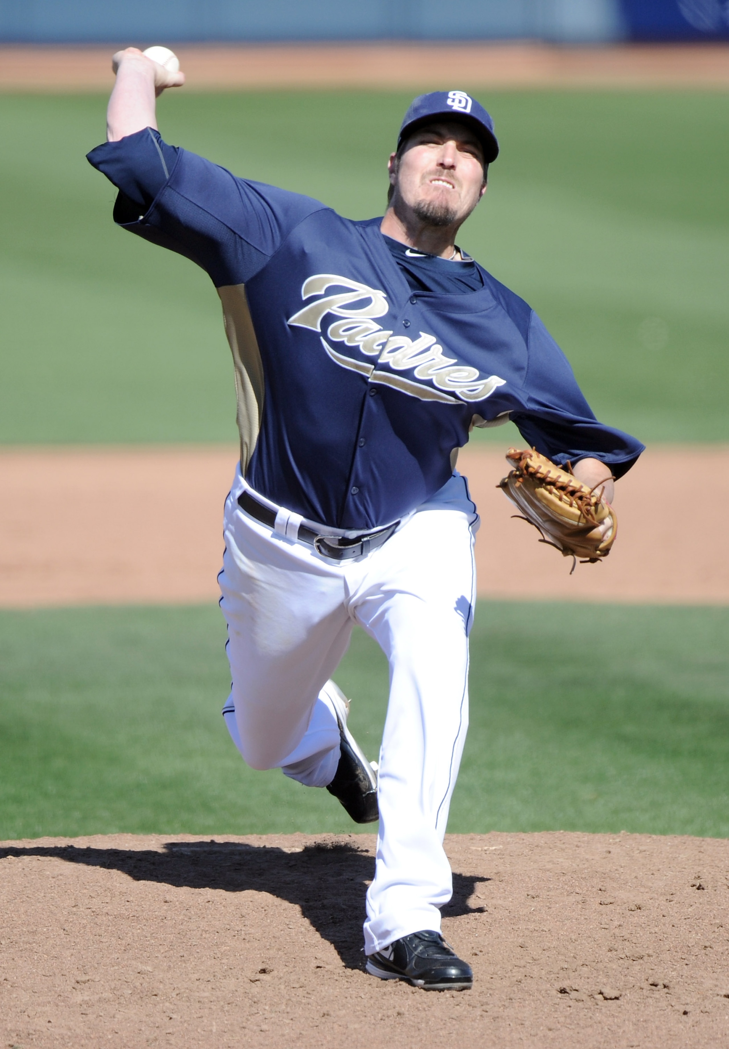 PEORIA, AZ - MARCH 02:  Chad Qualls #52 of the  San Diego Padres pitches against the Colorado Rockies during spring training at Peoria Stadium on March 2, 2011 in Peoria, Arizona.  (Photo by Harry How/Getty Images)
