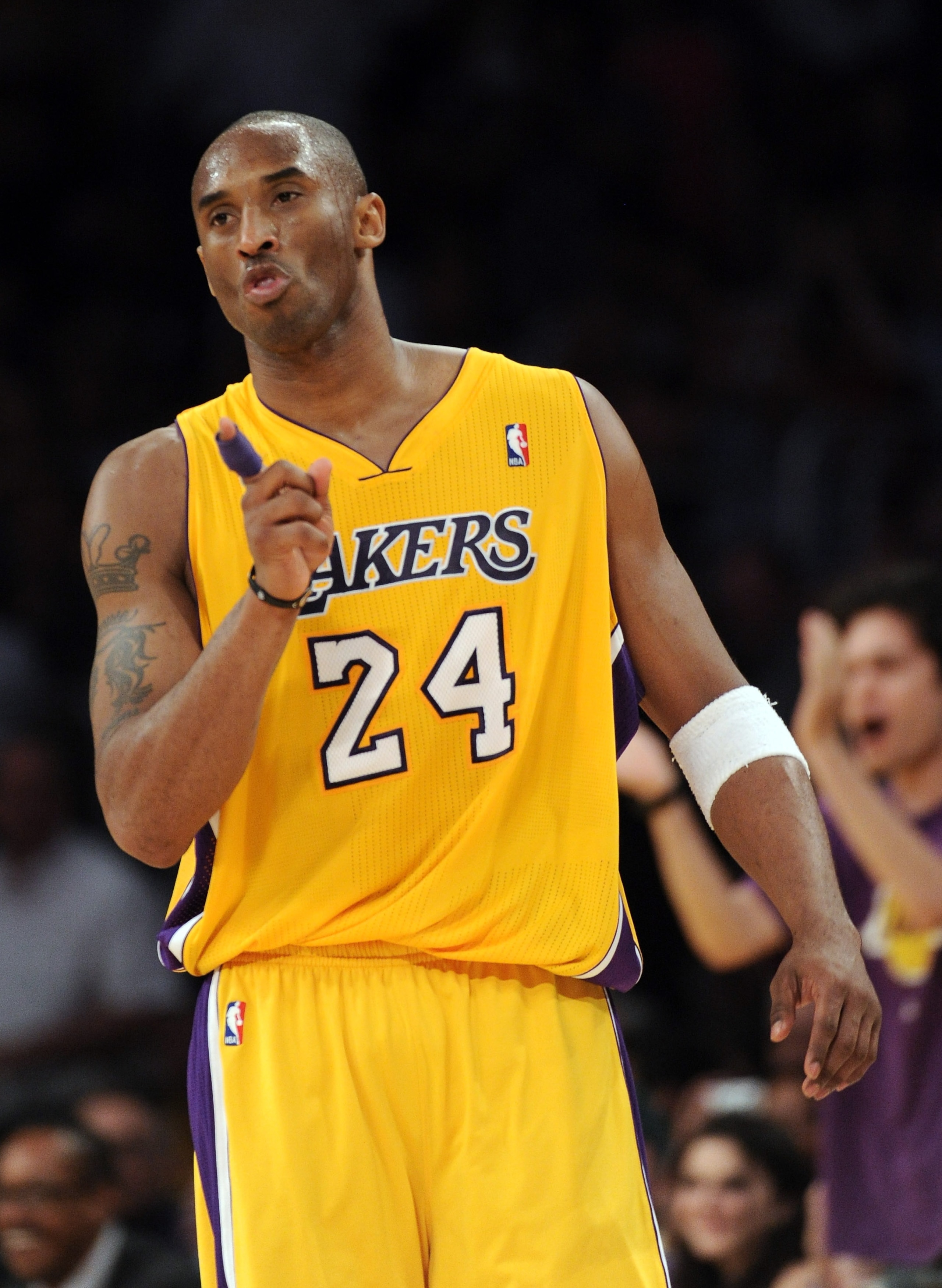 LOS ANGELES, CA - MARCH 31:  Kobe Bryant #24 of the Los Angeles Lakers reacts after his basket and a foul in a 110-82 win over the Dallas Mavericks at Staples Center on March 31, 2011 in Los Angeles, California.  NOTE TO USER: User expressly acknowledges