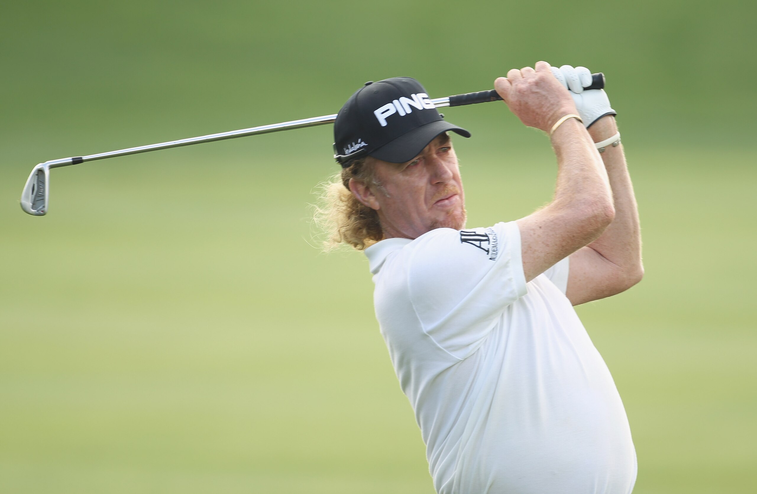 DUBAI, UNITED ARAB EMIRATES - FEBRUARY 10:  Miguel Angel Jimenez of Spain in action during the first round of the 2011 Omega Dubai Desert Classic held on the Majilis Course at the Emirates Golf Club on February 10, 2011 in Dubai, United Arab Emirates.  (P