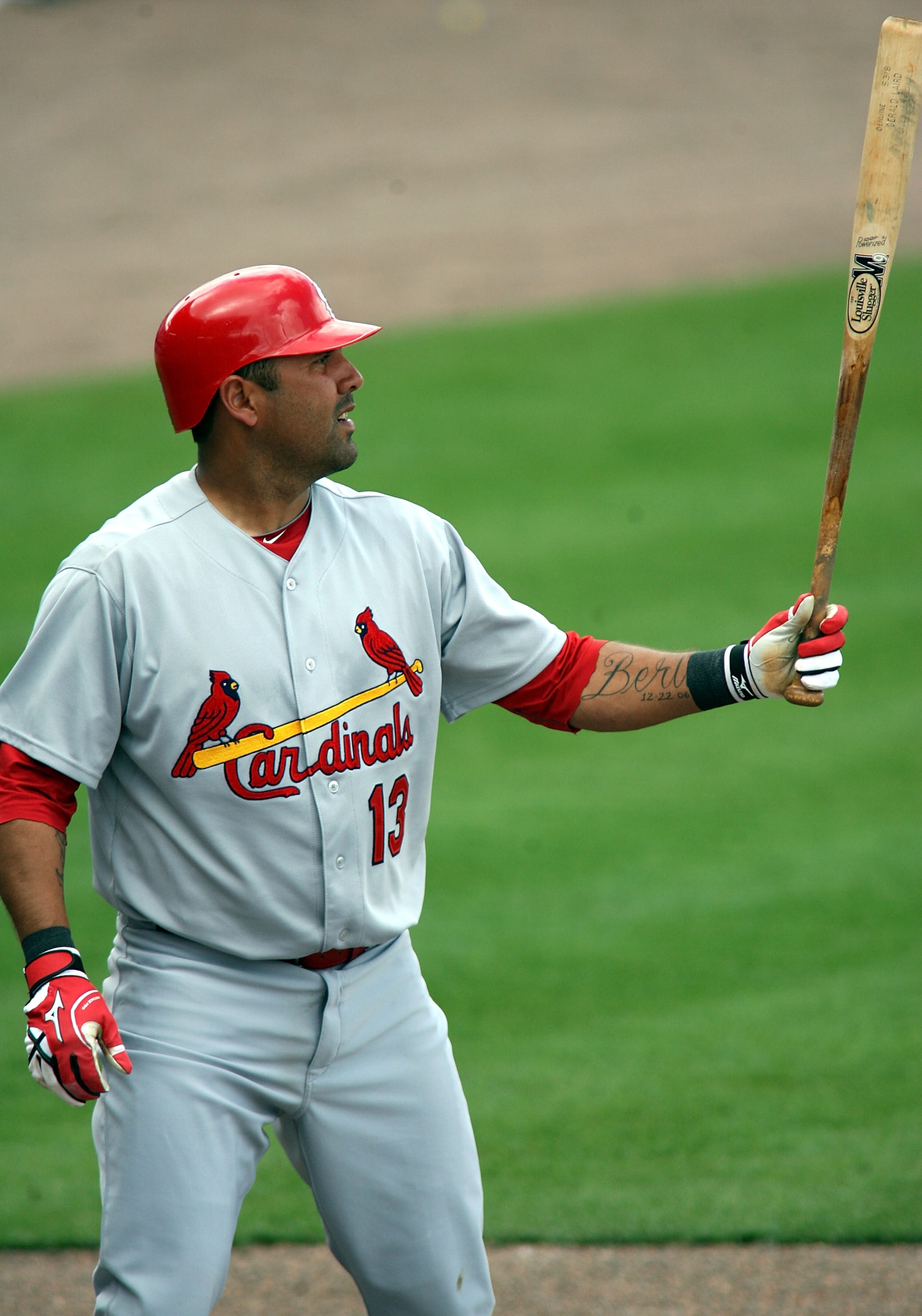 PORT ST. LUCIE, FL - MARCH 03:  Gerald Laird #13  of the St. Louis Cardinals bats against the New York Mets at Digital Domain Park on March 3, 2011 in Port St. Lucie, Florida.  (Photo by Marc Serota/Getty Images)
