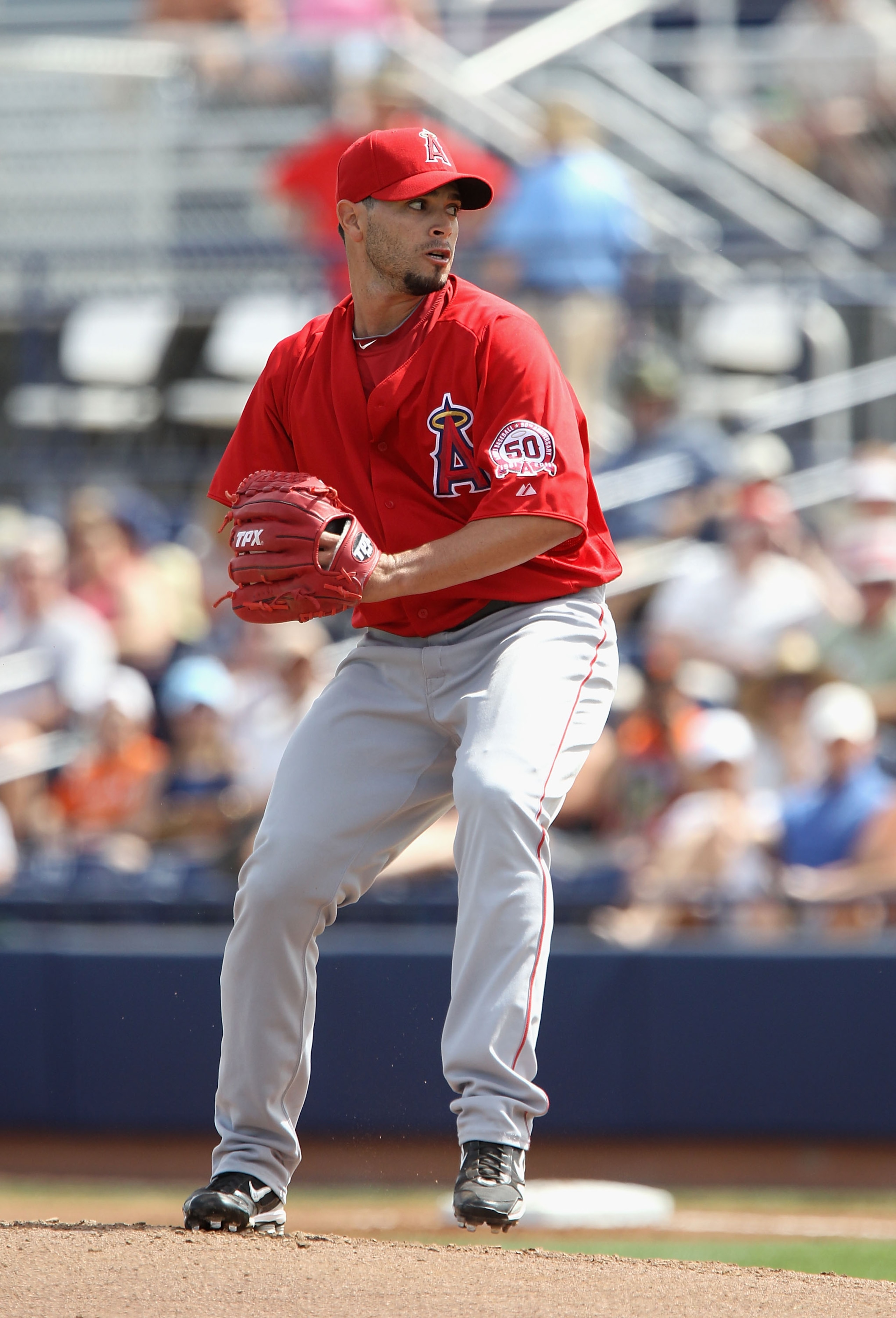PEORIA, AZ - MARCH 15:  Starting pitcher Joel Pineiro #35 of the Los Angeles Angels of Anaheim pitches against the San Diego Padres during the spring training game at Peoria Stadium on March 15, 2011 in Peoria, Arizona.  (Photo by Christian Petersen/Getty