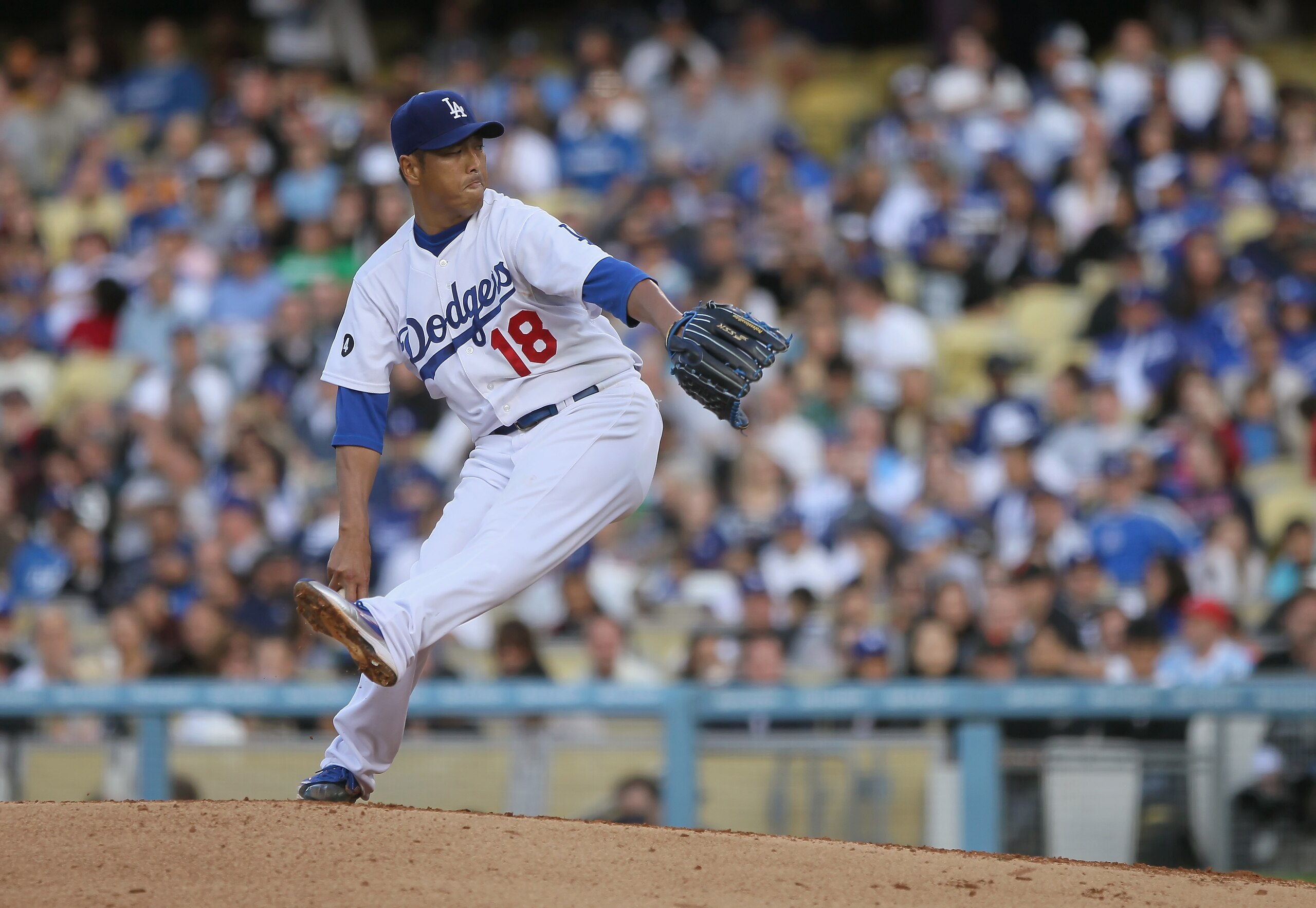 LOS ANGELES, CA - APRIL 03:  Hiroki Kuroda #18 of the Los Angeles Dodgers pitches against the San Francisco Giants in the fourth inning at Dodger Stadium on April 3, 2011 in Los Angeles, California.  (Photo by Jeff Gross/Getty Images)