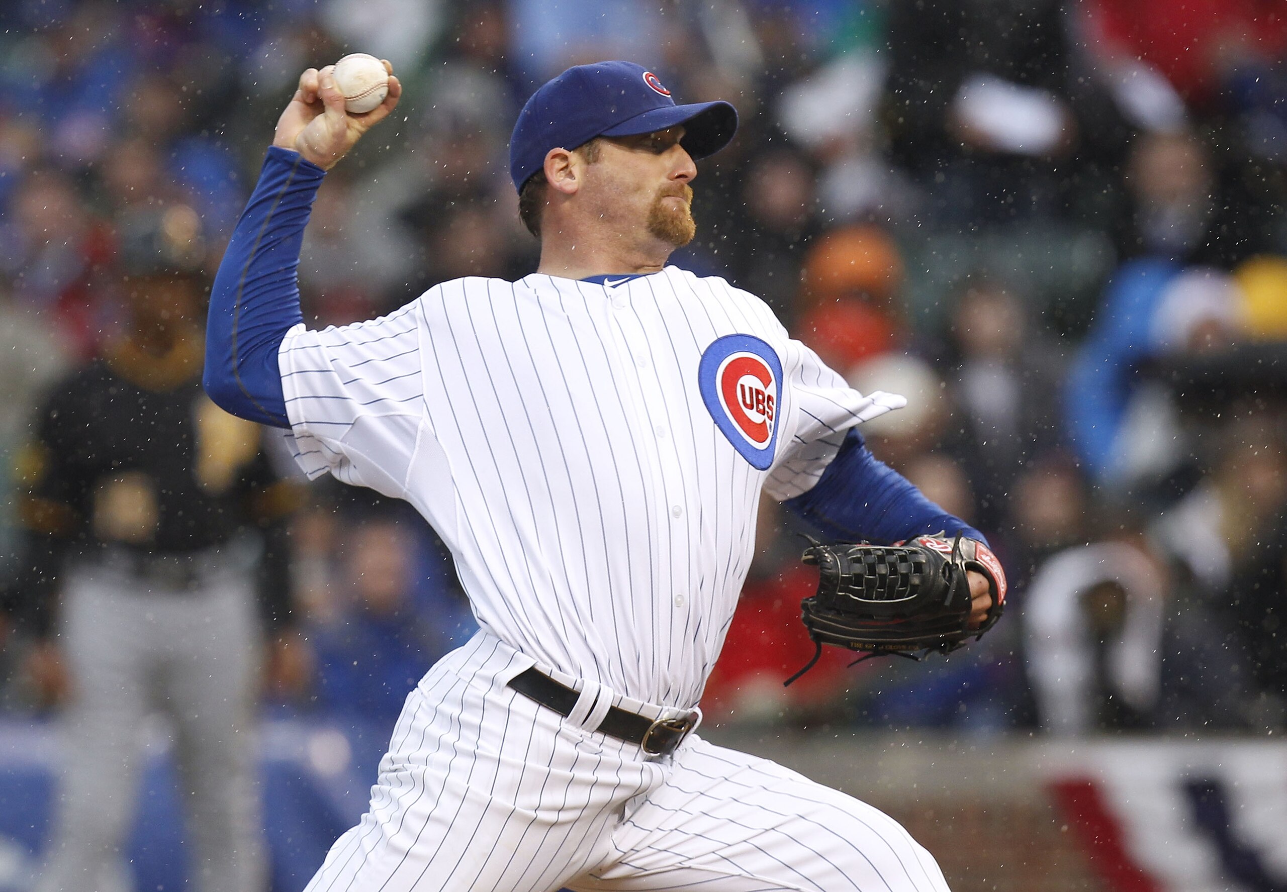 CHICAGO, IL - APRIL 01: Ryan Dempster #36 of the Chicago Cubs throws a first inning pitch while playing the Pittsburgh Pirates during opening day at Wrigley Field on April 1, 2011 in Chicago, Illinois.  (Photo by Gregory Shamus/Getty Images)