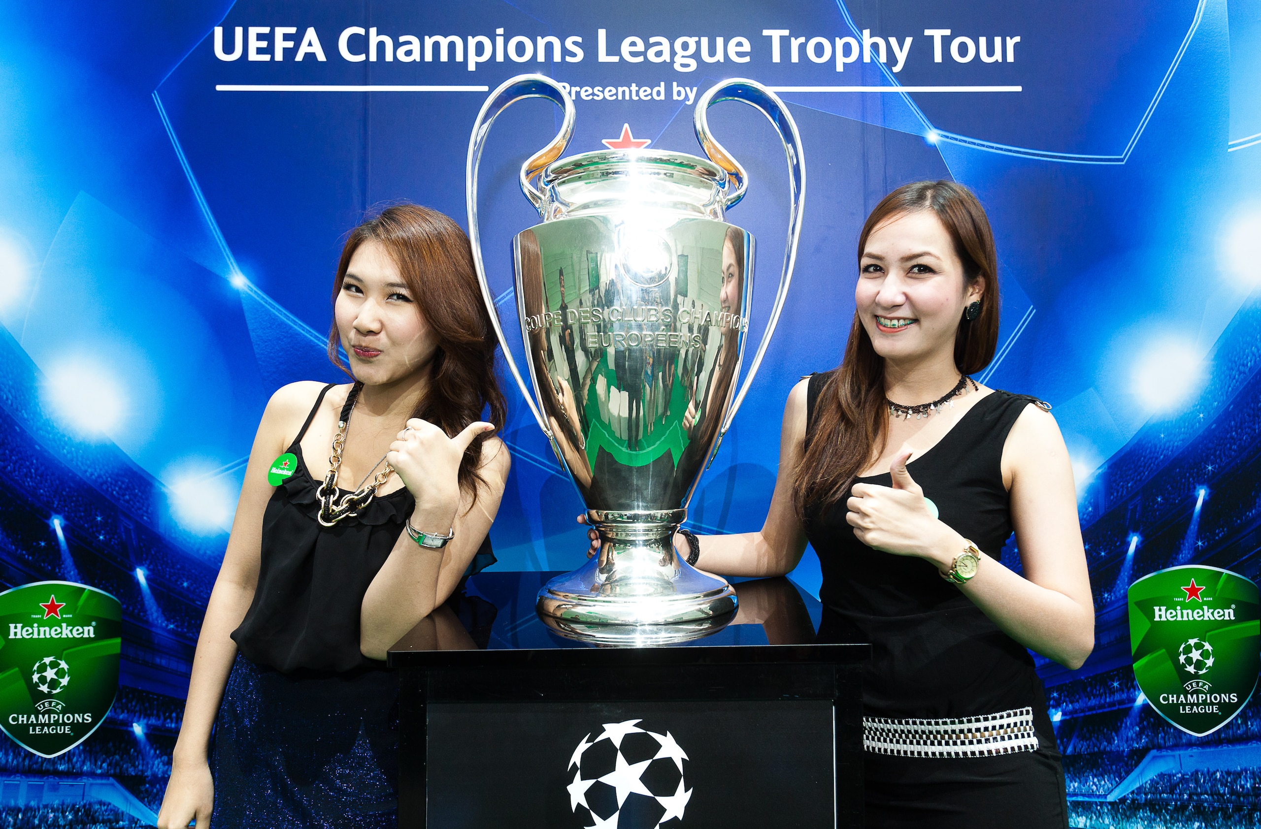 BANGKOK, THAILAND - MARCH 16: Thai girls pose with UEFA Champions League Trophy during the UEFA Champions League Trophy Tour Asia 2011 Press Conference on March 16, 2011 in Bangkok, Thailand. (Photo by Athit Perawongmetha/Getty Images) BANGKOK, THAILAND - MARCH 16: Thai girls pose with UEFA Champions League Trophy during the UEFA Champions League Trophy Tour Asia 2011 Press Conference on March 16, 2011 in Bangkok, Thailand. (Photo by Athit Perawongmetha/Getty Images)