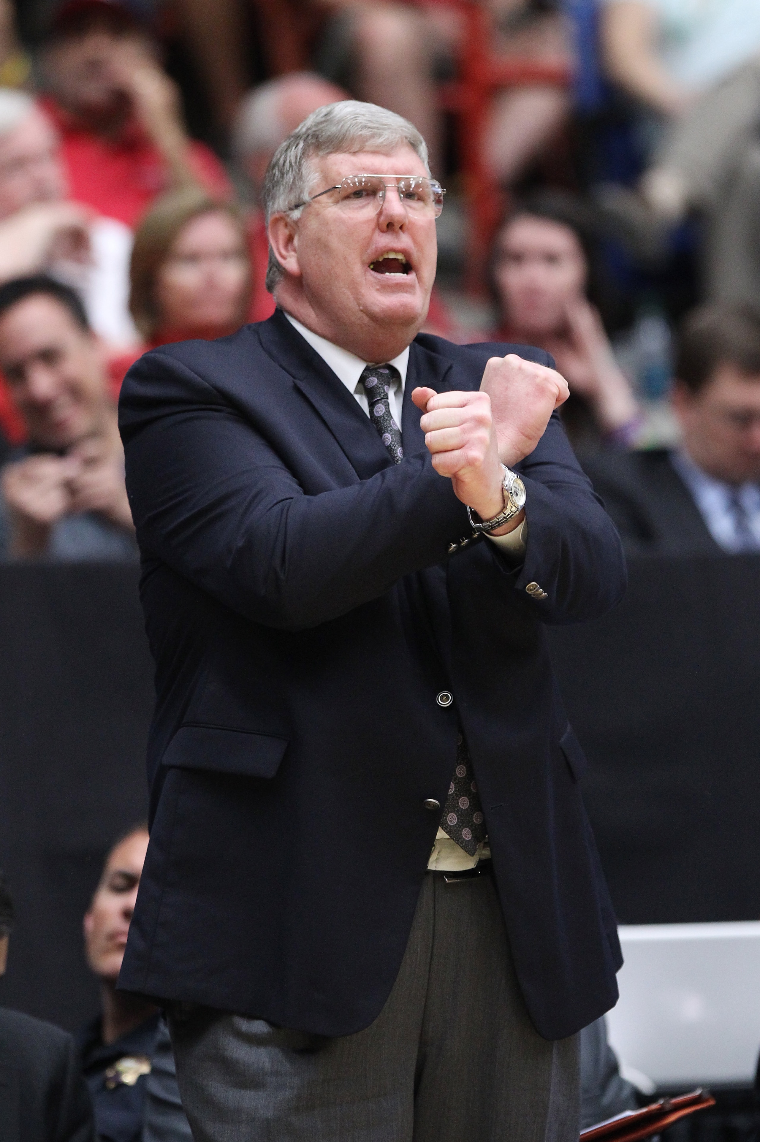 TUCSON, AZ - MARCH 17:  Head coach Stew Morrill of the Utah State Aggies coaches against the Kansas State Wildcats during the second round of the 2011 NCAA men's basketball tournament at McKale Center on March 17, 2011 in Tucson, Arizona.  (Photo by Chris