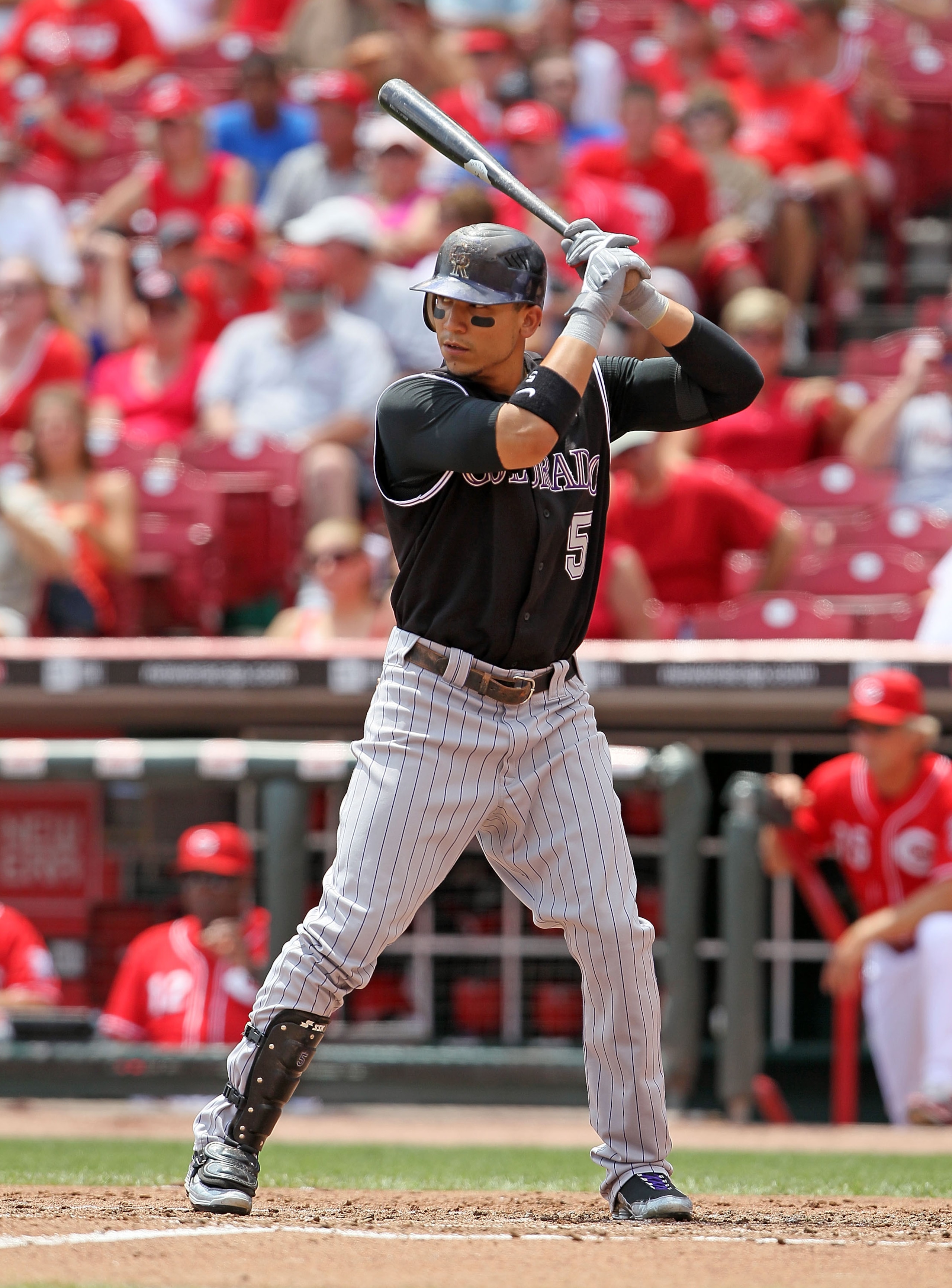CINCINNATI - JULY 18:  Carlos Gonzalez #5 of the Colorado Rockies is at bat during the game against the Cincinnati Reds at Great American Ball Park on July 18, 2010 in Cincinnati, Ohio.  (Photo by Andy Lyons/Getty Images)