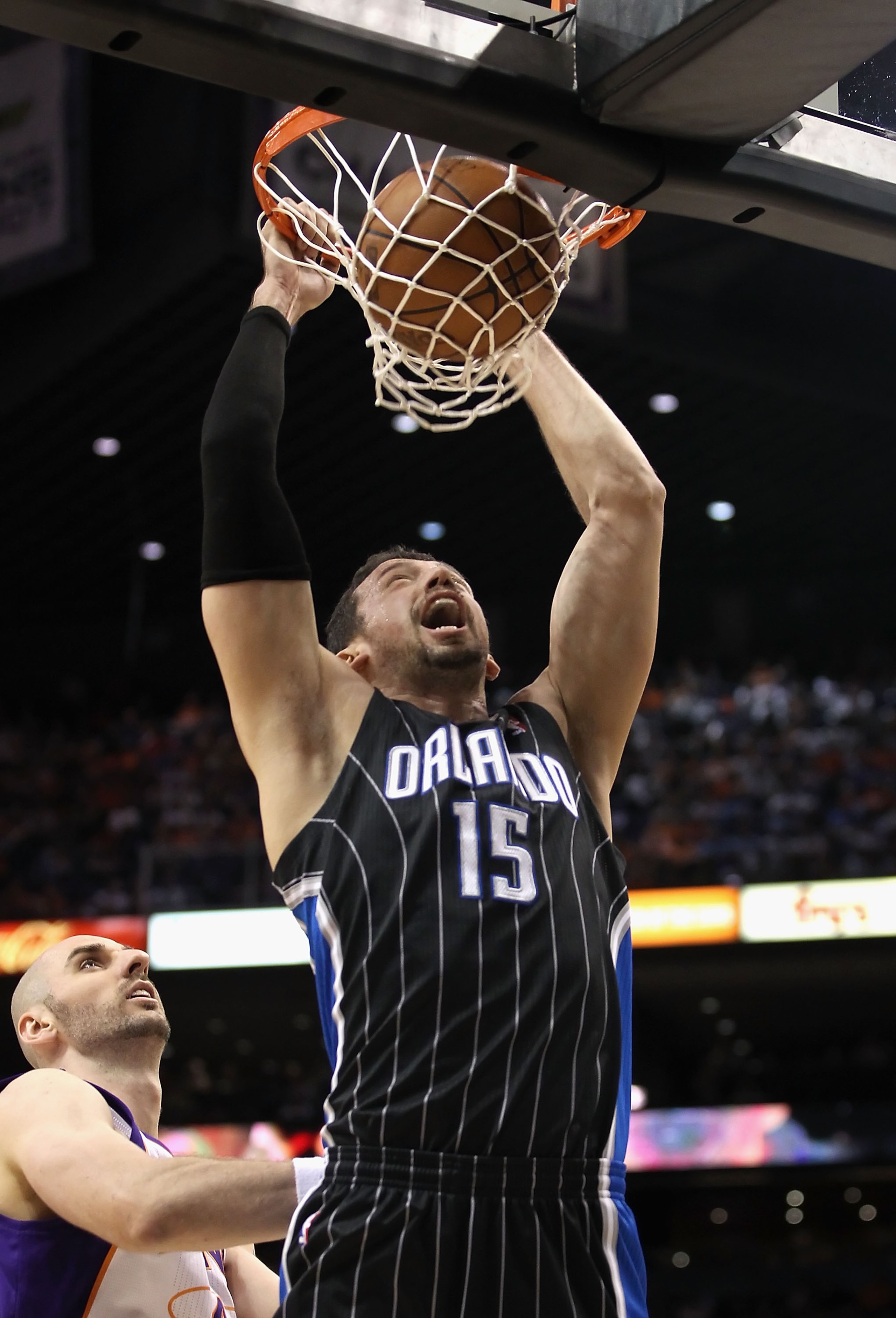 PHOENIX, AZ - MARCH 13: Hedo Turkoglu #15 of the Orlando Magic slam dunks the ball against the Phoenix Suns during the NBA game at US Airways Center on March 13, 2011 in Phoenix, Arizona. The Magic defeated the Suns 111-88. NOTE TO USER: User expressly PHOENIX, AZ - MARCH 13: Hedo Turkoglu #15 of the Orlando Magic slam dunks the ball against the Phoenix Suns during the NBA game at US Airways Center on March 13, 2011 in Phoenix, Arizona. The Magic defeated the Suns 111-88. NOTE TO USER: User expressly