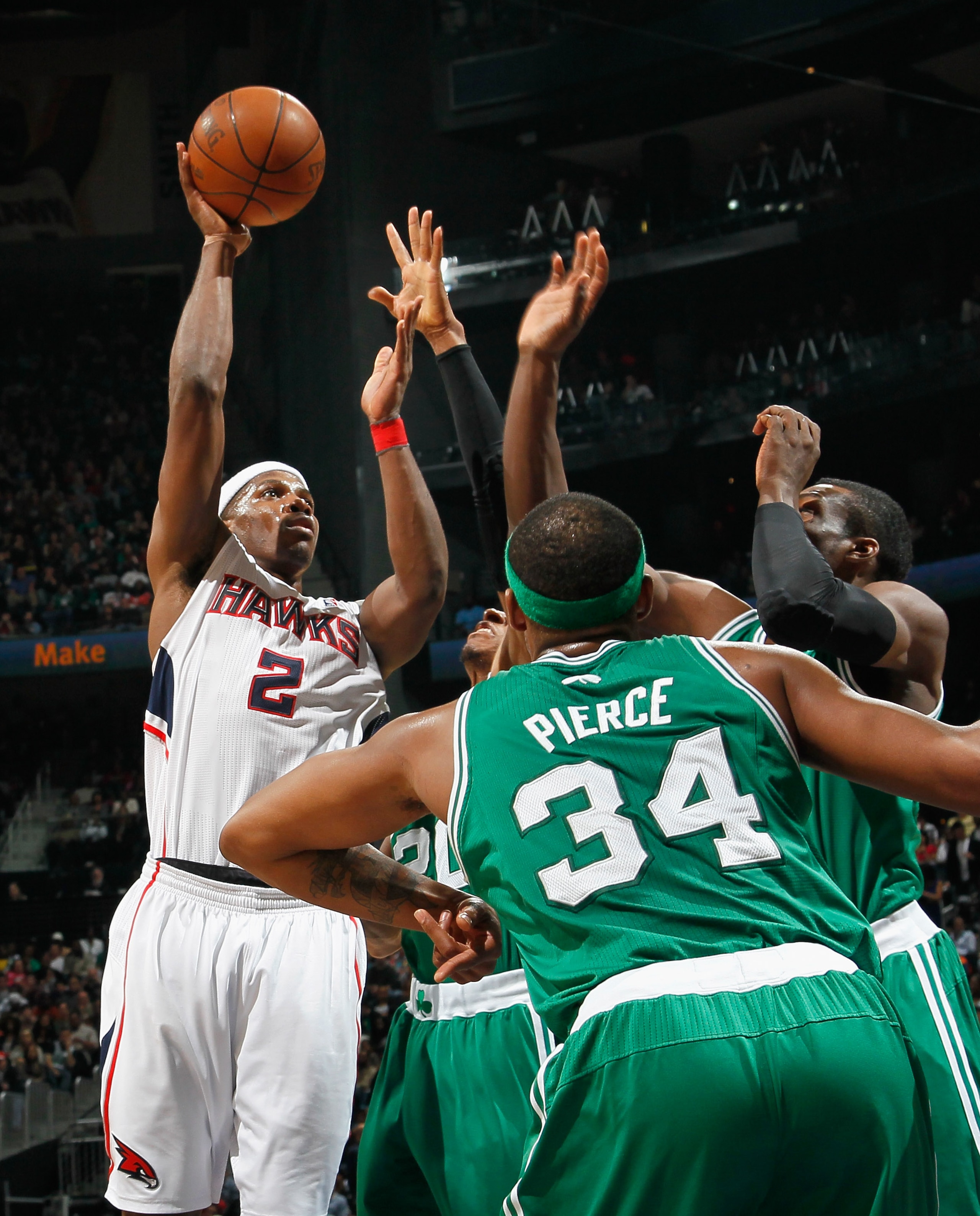 ATLANTA, GA - APRIL 01: Joe Johnson #2 of the Atlanta Hawks shoots over Paul Pierce and the Boston Celtics at Philips Arena on April 1, 2011 in Atlanta, Georgia. NOTE TO USER: User expressly acknowledges and agrees that, by downloading and/or using this ATLANTA, GA - APRIL 01: Joe Johnson #2 of the Atlanta Hawks shoots over Paul Pierce and the Boston Celtics at Philips Arena on April 1, 2011 in Atlanta, Georgia. NOTE TO USER: User expressly acknowledges and agrees that, by downloading and/or using this