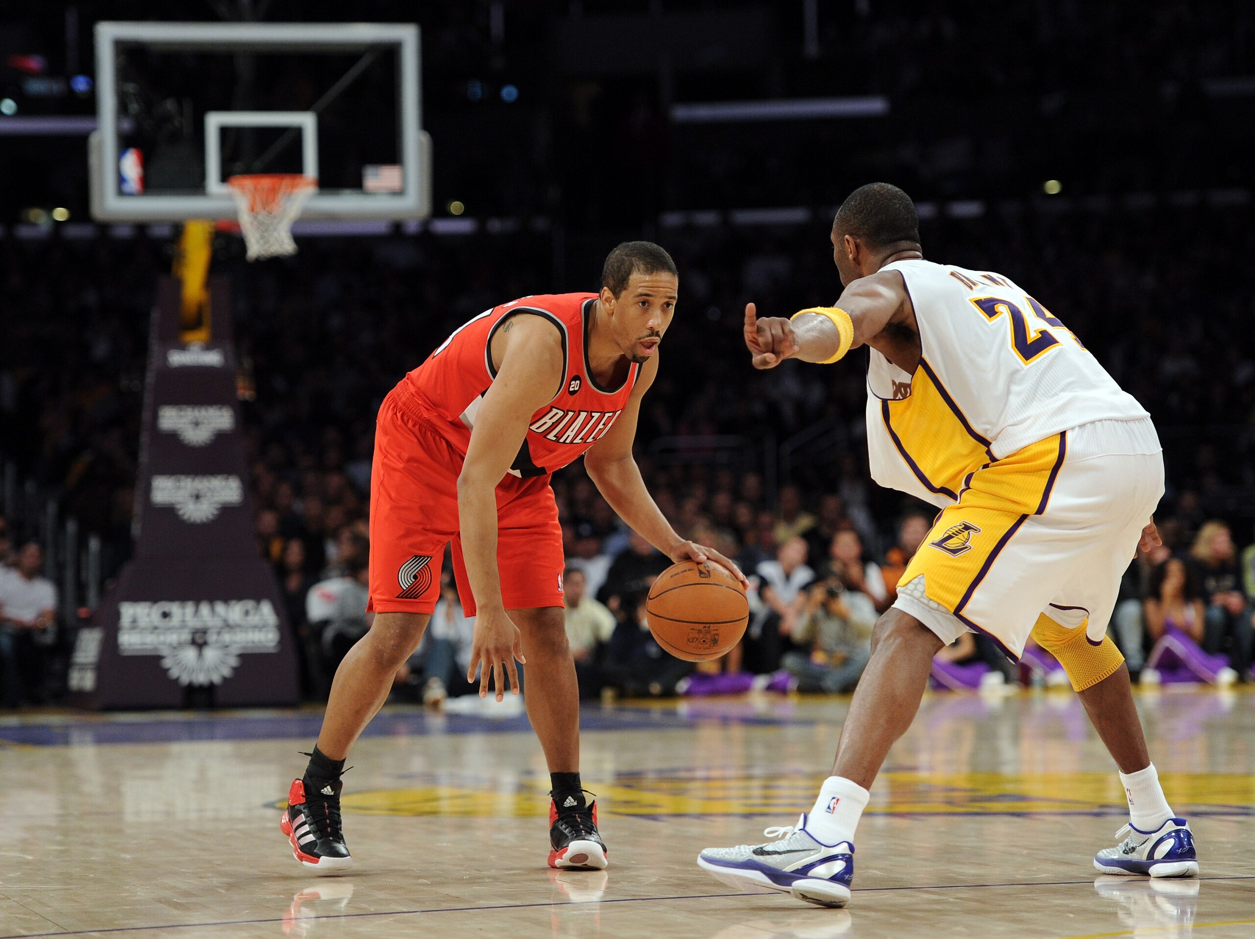 LOS ANGELES, CA - MARCH 20: Andre Miller #24 of the Portland Trail Blazers faces off against Kobe Bryant #24 of the Los Angeles Lakers at the Staples Center on March 20, 2011 in Los Angeles, California. NOTE TO USER: User expressly acknowledges and agre LOS ANGELES, CA - MARCH 20: Andre Miller #24 of the Portland Trail Blazers faces off against Kobe Bryant #24 of the Los Angeles Lakers at the Staples Center on March 20, 2011 in Los Angeles, California. NOTE TO USER: User expressly acknowledges and agre