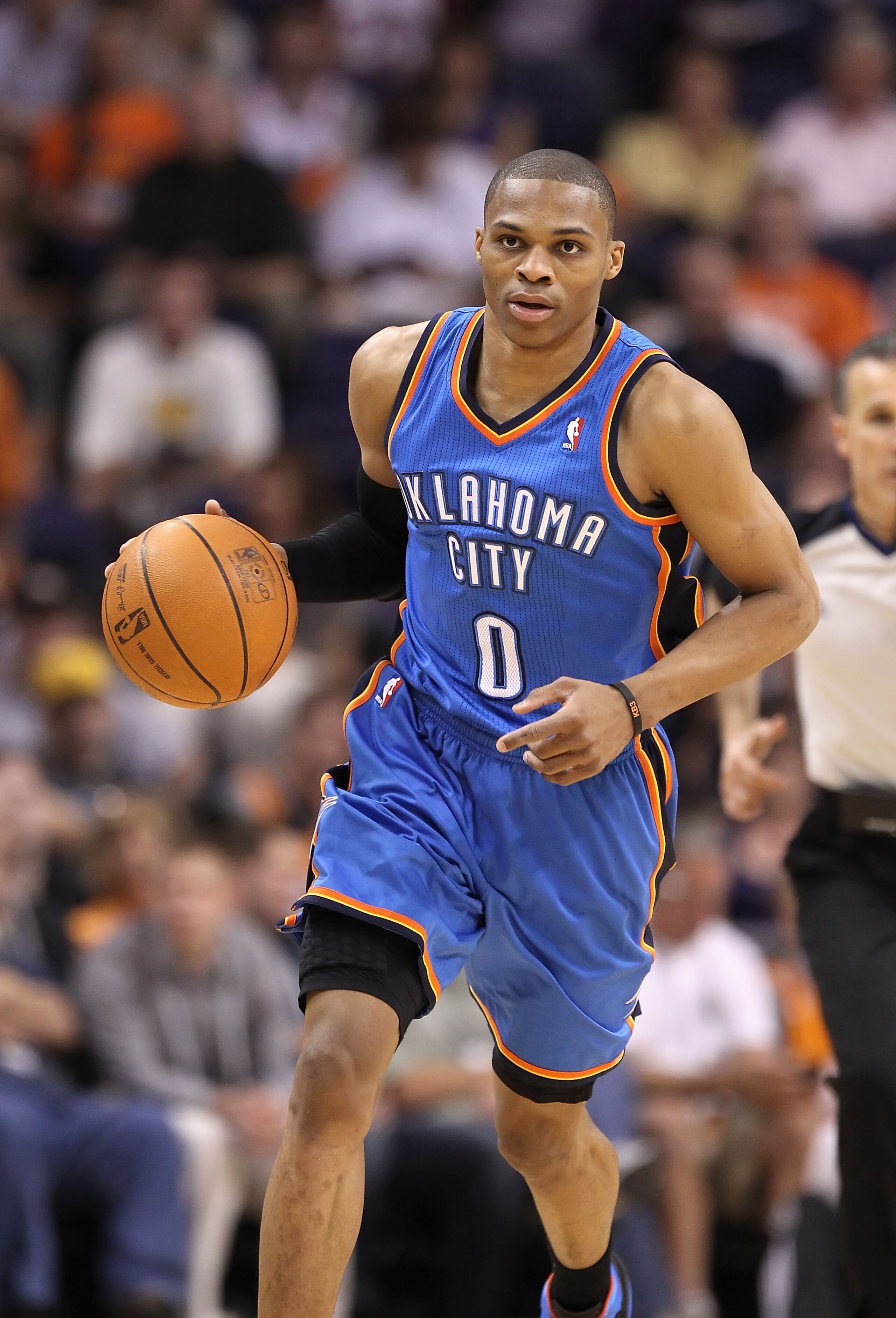 PHOENIX, AZ - MARCH 30: Russell Westbrook #0 of the Oklahoma City Thunder handles the ball during the NBA game against the Phoenix Suns at US Airways Center on March 30, 2011 in Phoenix, Arizona. The Thunder defeated the Suns 116-98. NOTE TO USER: User PHOENIX, AZ - MARCH 30: Russell Westbrook #0 of the Oklahoma City Thunder handles the ball during the NBA game against the Phoenix Suns at US Airways Center on March 30, 2011 in Phoenix, Arizona. The Thunder defeated the Suns 116-98. NOTE TO USER: User