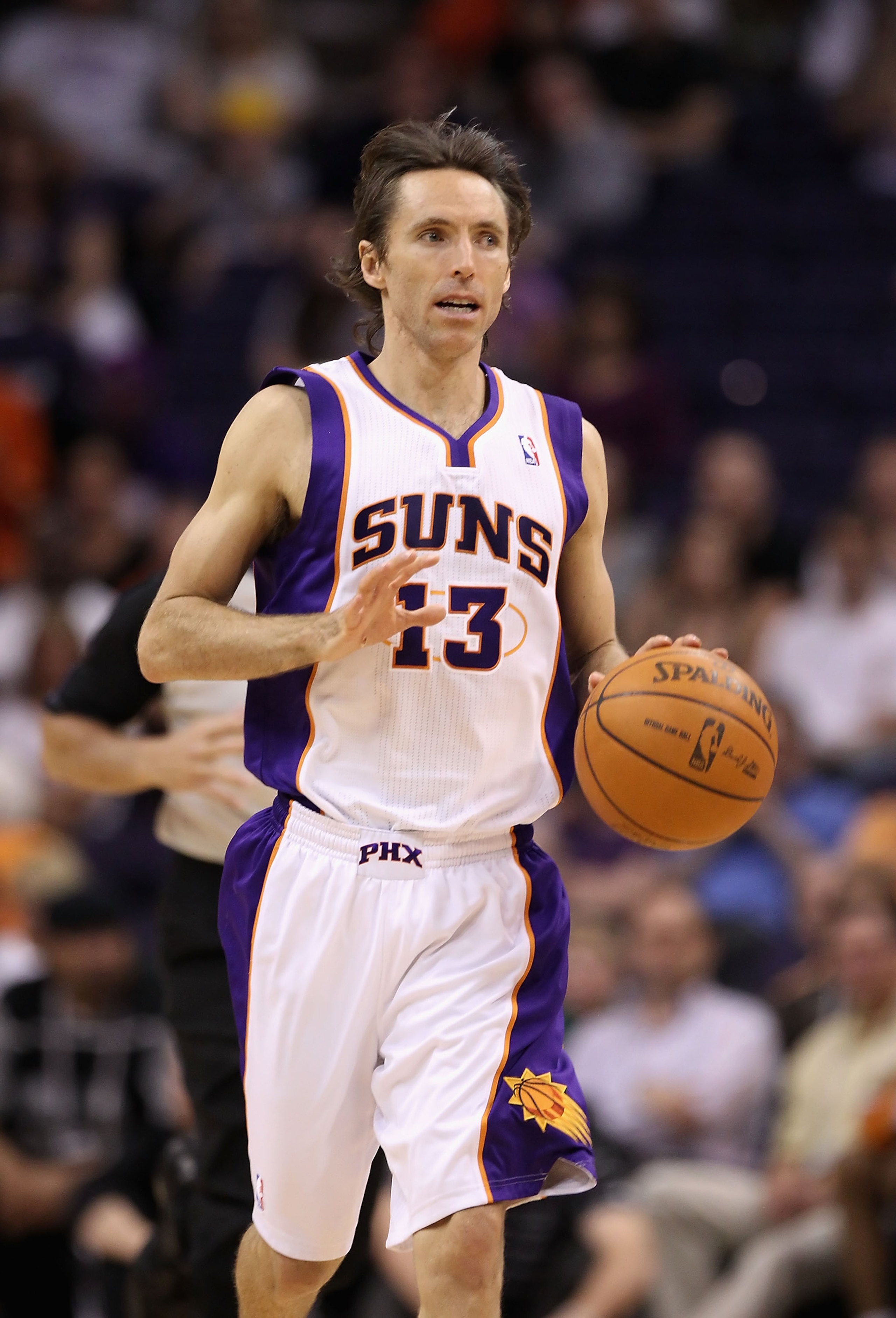 PHOENIX, AZ - MARCH 30: Steve Nash #13 of the Phoenix Suns in action during the NBA game against the Oklahoma City Thunder at US Airways Center on March 30, 2011 in Phoenix, Arizona. The Thunder defeated the Suns 116-98. NOTE TO USER: User expressly ack PHOENIX, AZ - MARCH 30: Steve Nash #13 of the Phoenix Suns in action during the NBA game against the Oklahoma City Thunder at US Airways Center on March 30, 2011 in Phoenix, Arizona. The Thunder defeated the Suns 116-98. NOTE TO USER: User expressly ack