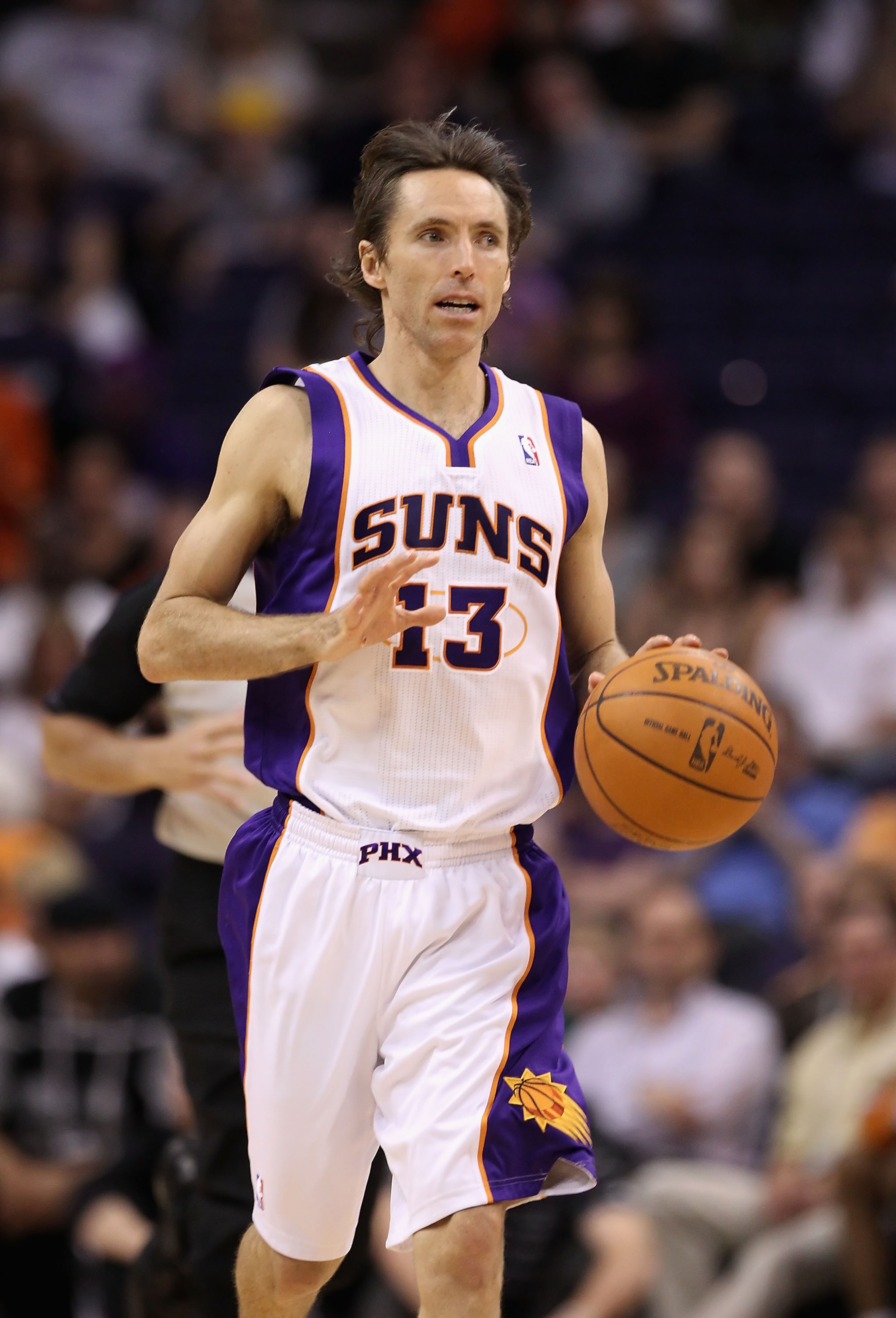 PHOENIX, AZ - MARCH 30: Steve Nash #13 of the Phoenix Suns in action during the NBA game against the Oklahoma City Thunder at US Airways Center on March 30, 2011 in Phoenix, Arizona. The Thunder defeated the Suns 116-98. NOTE TO USER: User expressly ack PHOENIX, AZ - MARCH 30: Steve Nash #13 of the Phoenix Suns in action during the NBA game against the Oklahoma City Thunder at US Airways Center on March 30, 2011 in Phoenix, Arizona. The Thunder defeated the Suns 116-98. NOTE TO USER: User expressly ack