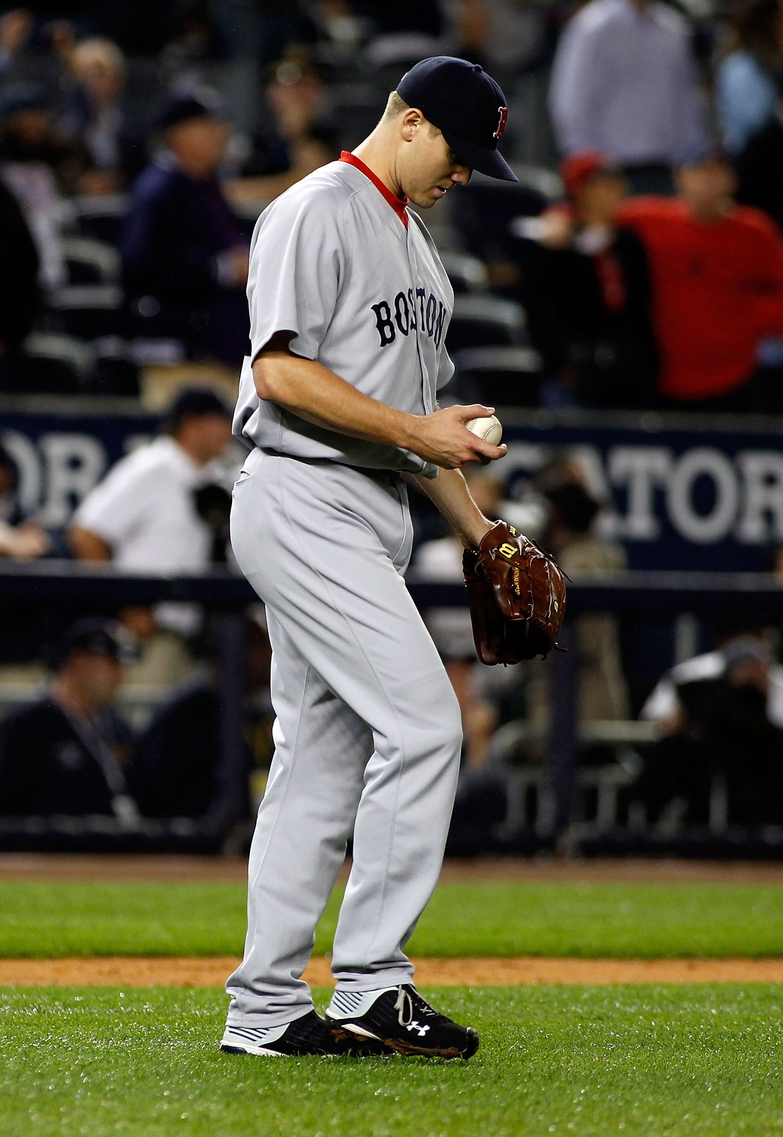 NEW YORK - SEPTEMBER 26:  Jonathan Papelbon #58 of the Boston Red Sox looks on aganist the New York Yankees bunt attempt in the 10th inning on September 26, 2010 at Yankee Stadium in the Bronx borough of New York City. The Yankees won 4-3.  (Photo by Mike