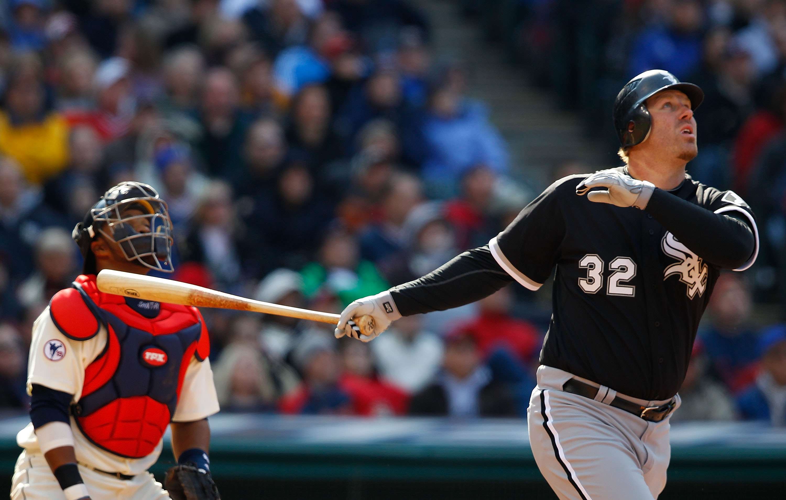 CLEVELAND - APRIL 01:  Adam Dunn #32 of the Chicago White Sox hits a two-run home run agains the Cleveland Indians during the Opening Day game on April 1, 2011 at Progressive Field in Cleveland, Ohio.  (Photo by Jared Wickerham/Getty Images)