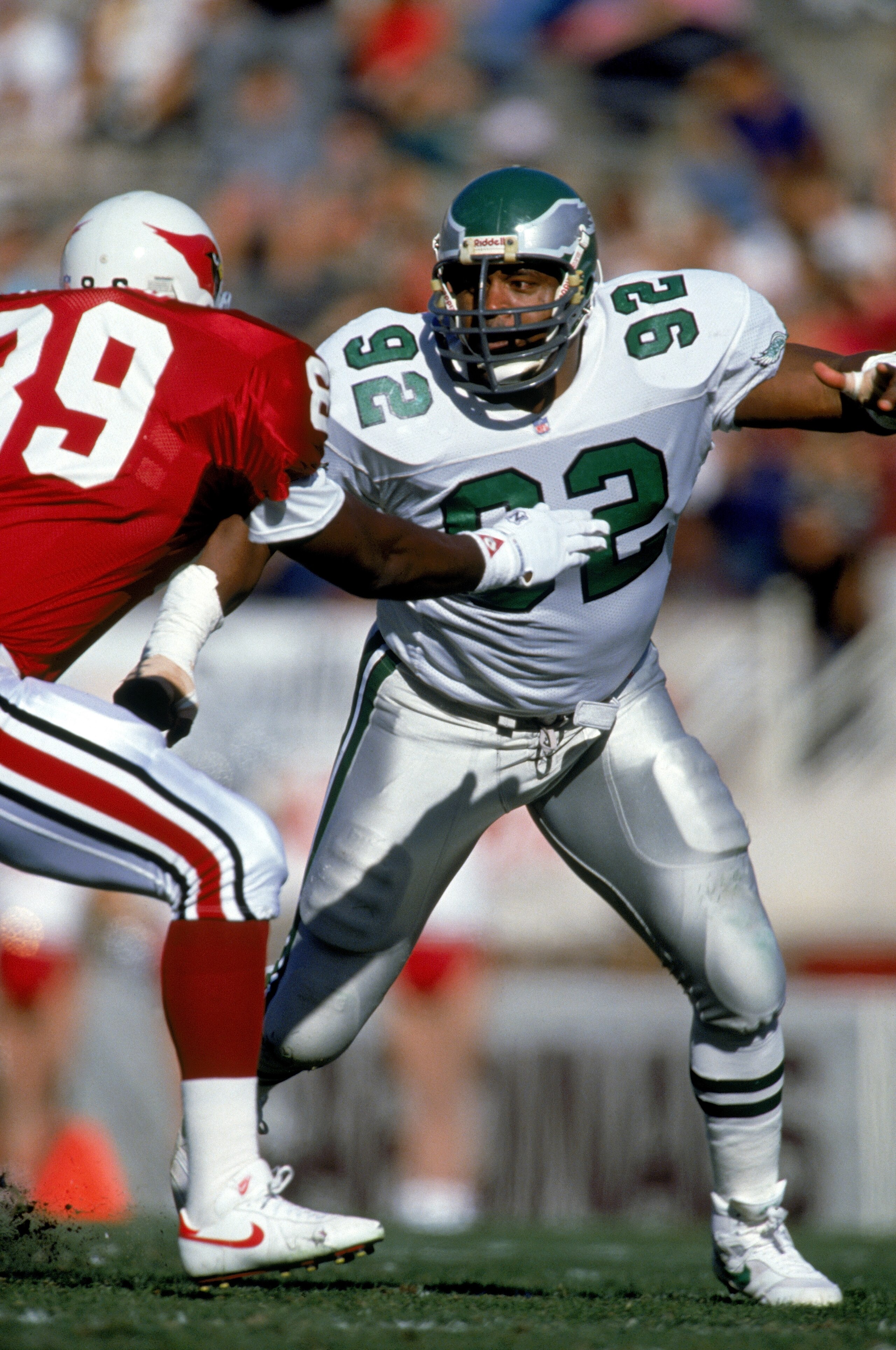 PHOENIX - NOVEMBER 24:  Defensive end Reggie White #92 of the Philadelphia Eagles avoids offense as he runs pass coverage during a game against the Phoenix Cardinals on November 24, 1991 at Sun Devil Stadium in Phoenix, Arizona. (Photo by Mike Powell/Gett