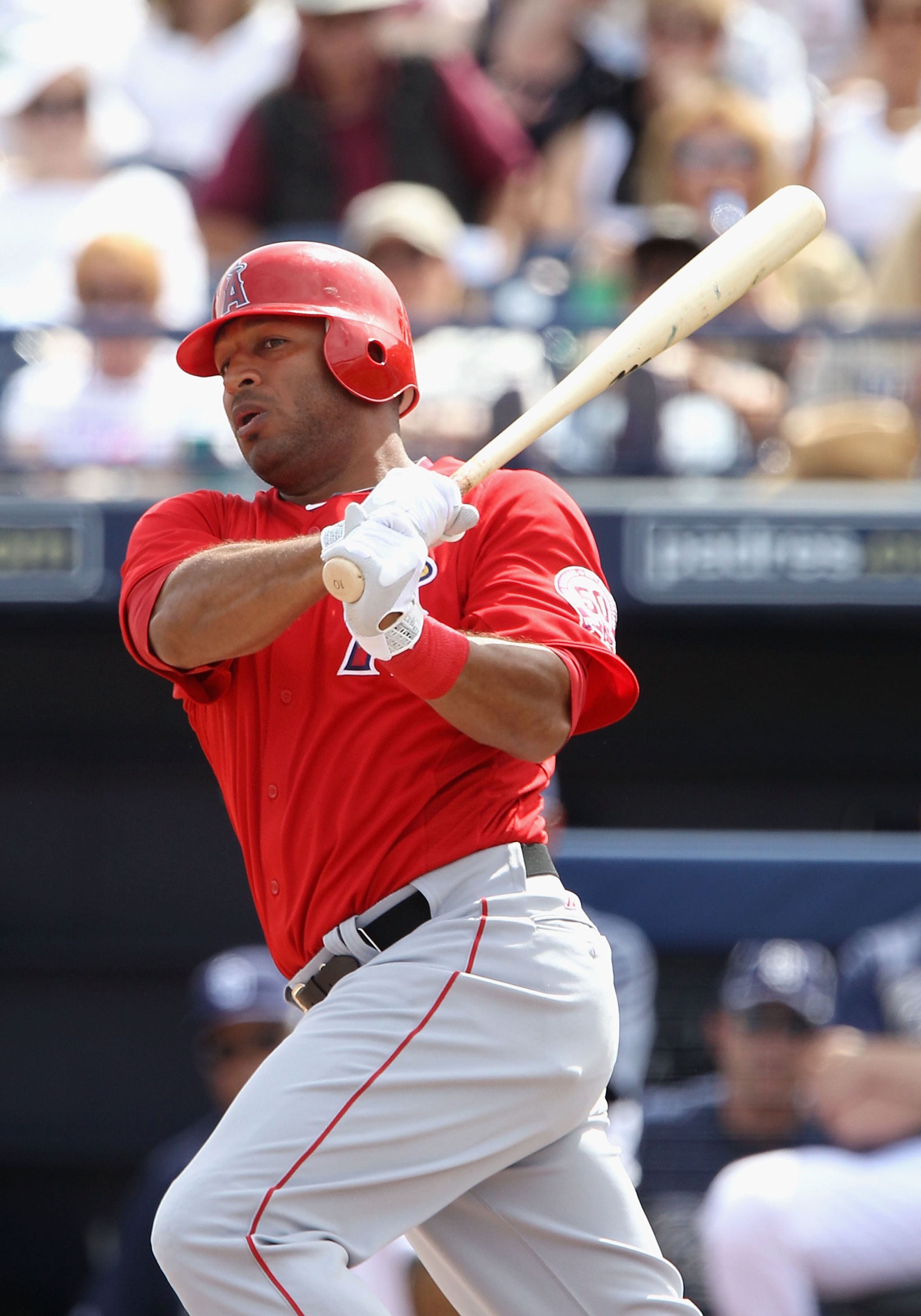 PEORIA, AZ - MARCH 15:  Vernon Wells #10 of the Los Angeles Angels of Anaheim bats against the San Diego Padres during the spring training game at Peoria Stadium on March 15, 2011 in Peoria, Arizona.  (Photo by Christian Petersen/Getty Images)