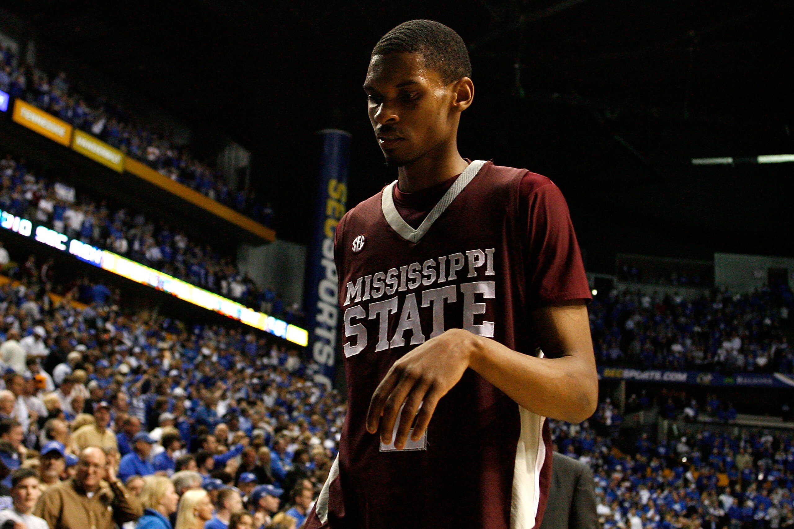 NASHVILLE, TN - MARCH 14:  Ravern Johnson #2 of the Mississippi State Bulldogs walks off the court dejected after Mississippi lost 75-74 in overtime against the Kentucky Wildcats during the final of the SEC Men's Basketball Tournament at the Bridgestone A